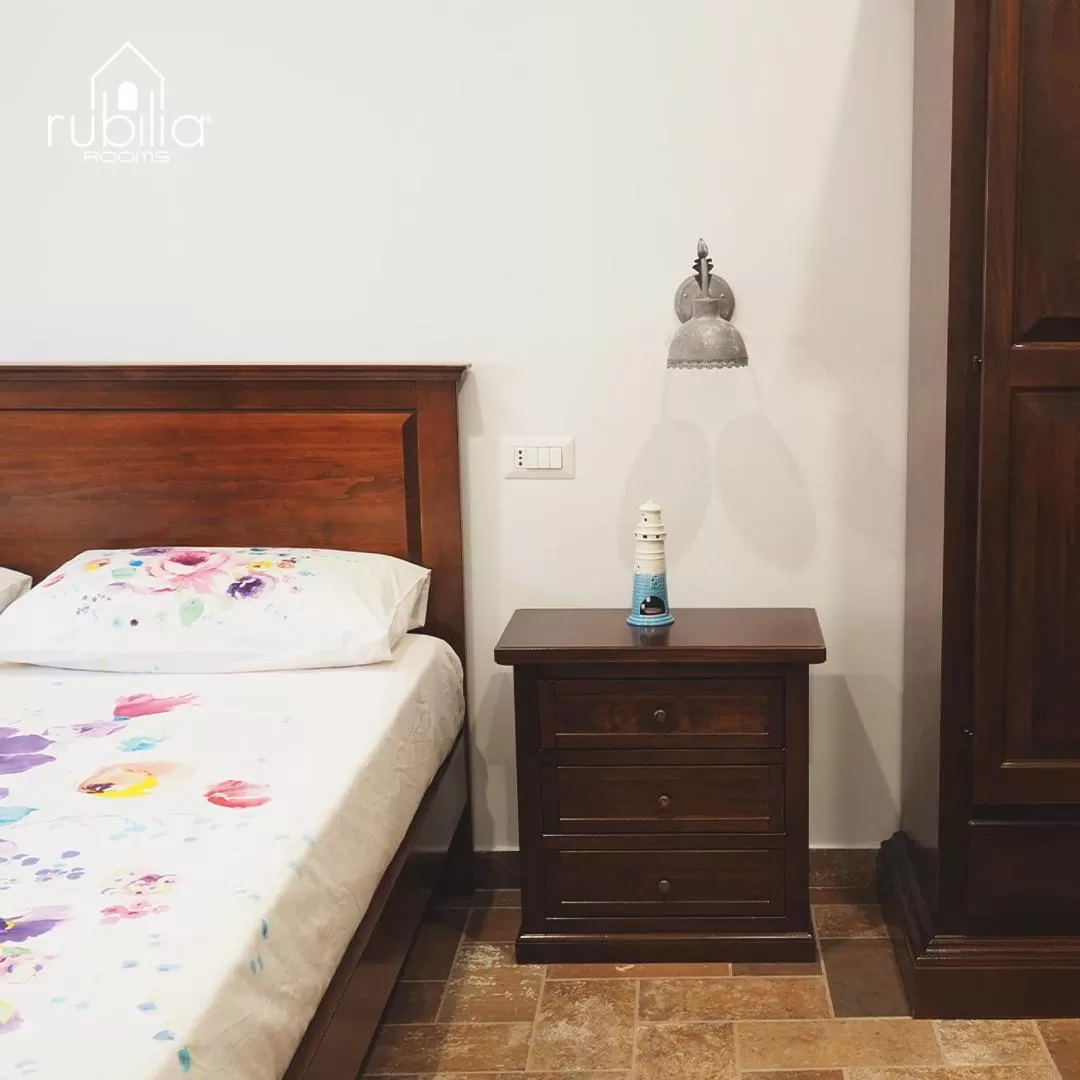 Bed in Rubilia Rooms Pompei