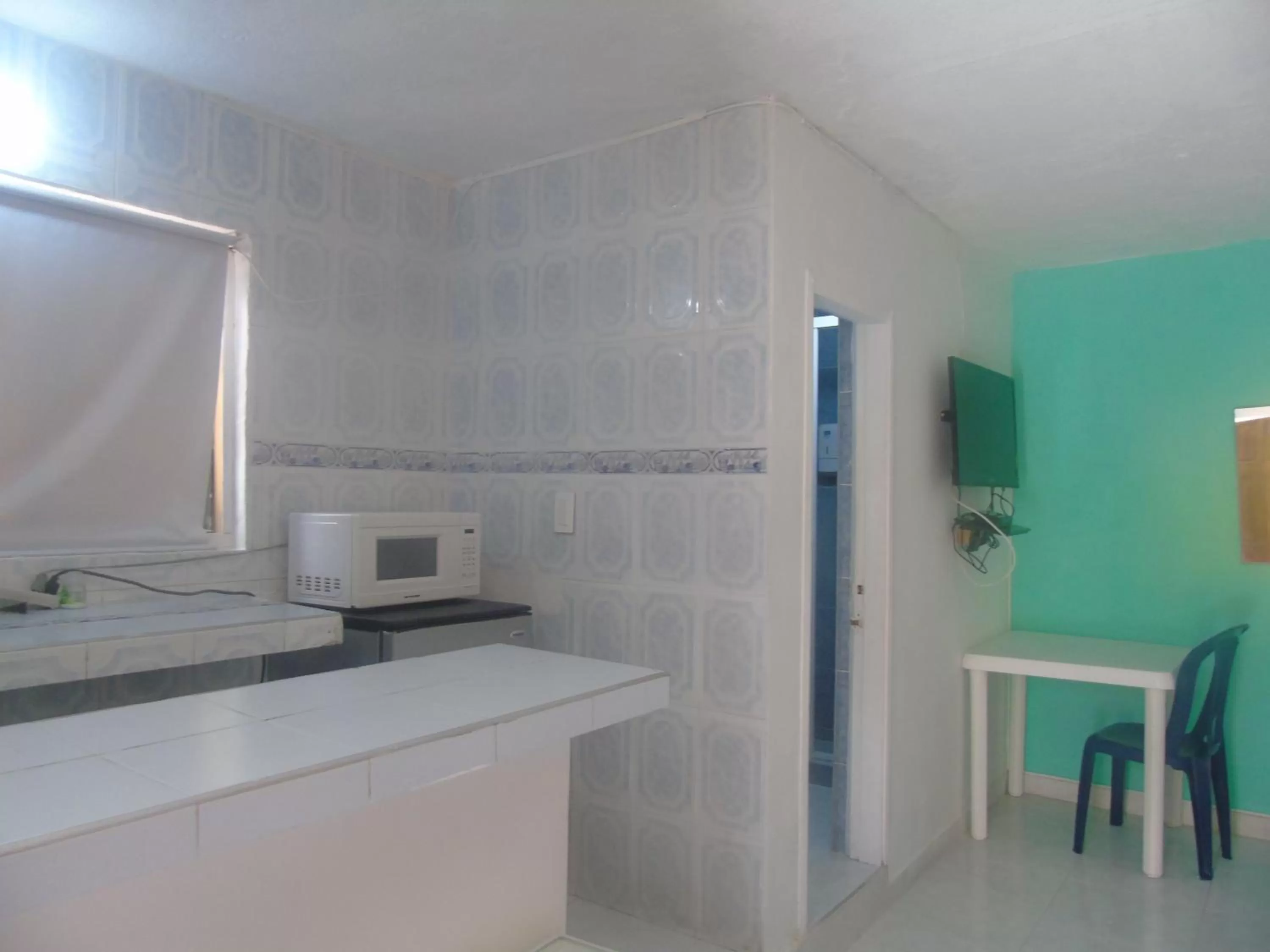 Kitchen or kitchenette in Posada Miss Joyce House