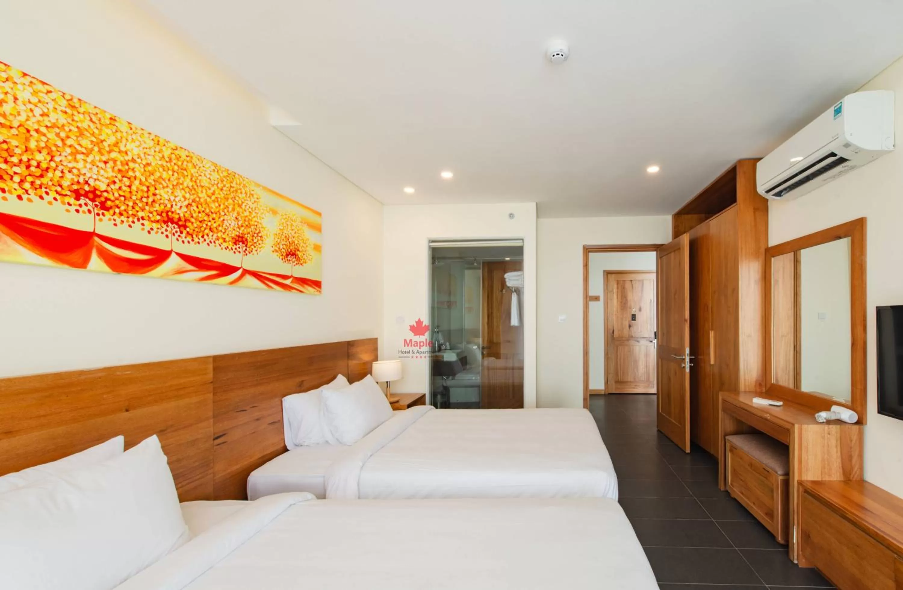 Bed in Maple Hotel & Apartment