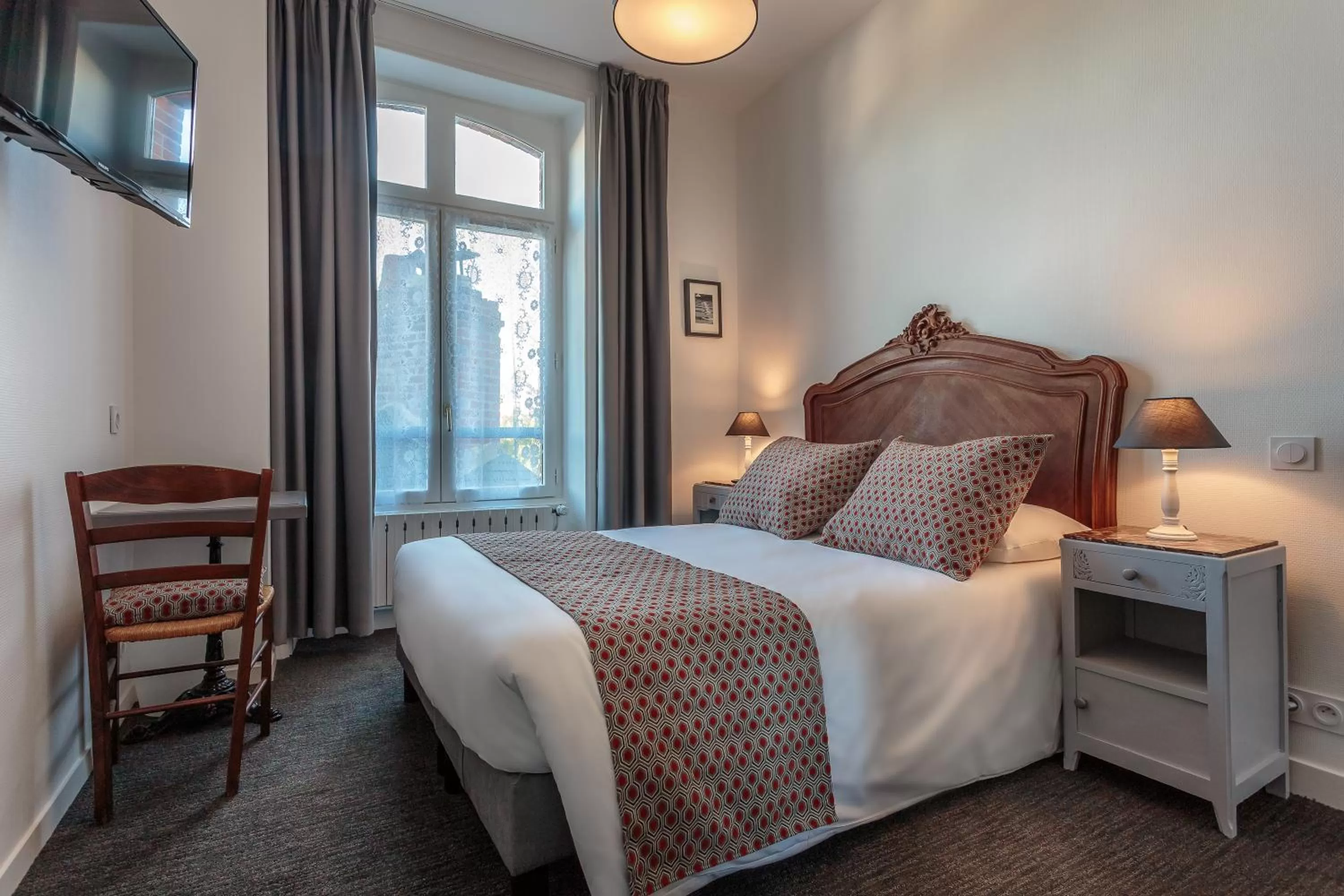 Photo of the whole room, Bed in Hôtel des Marais Salants