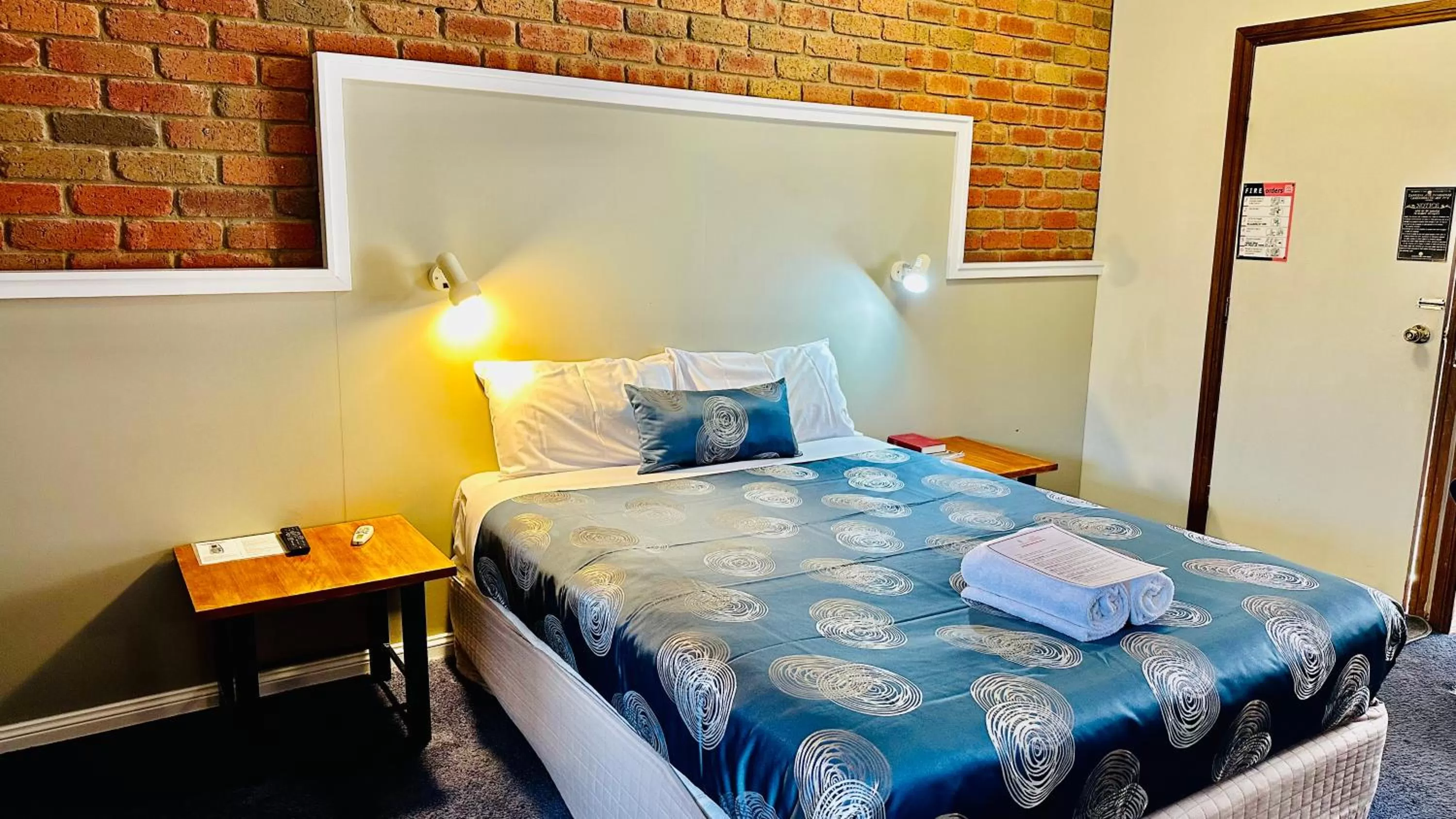 Bed in Early Australian Motor Inn