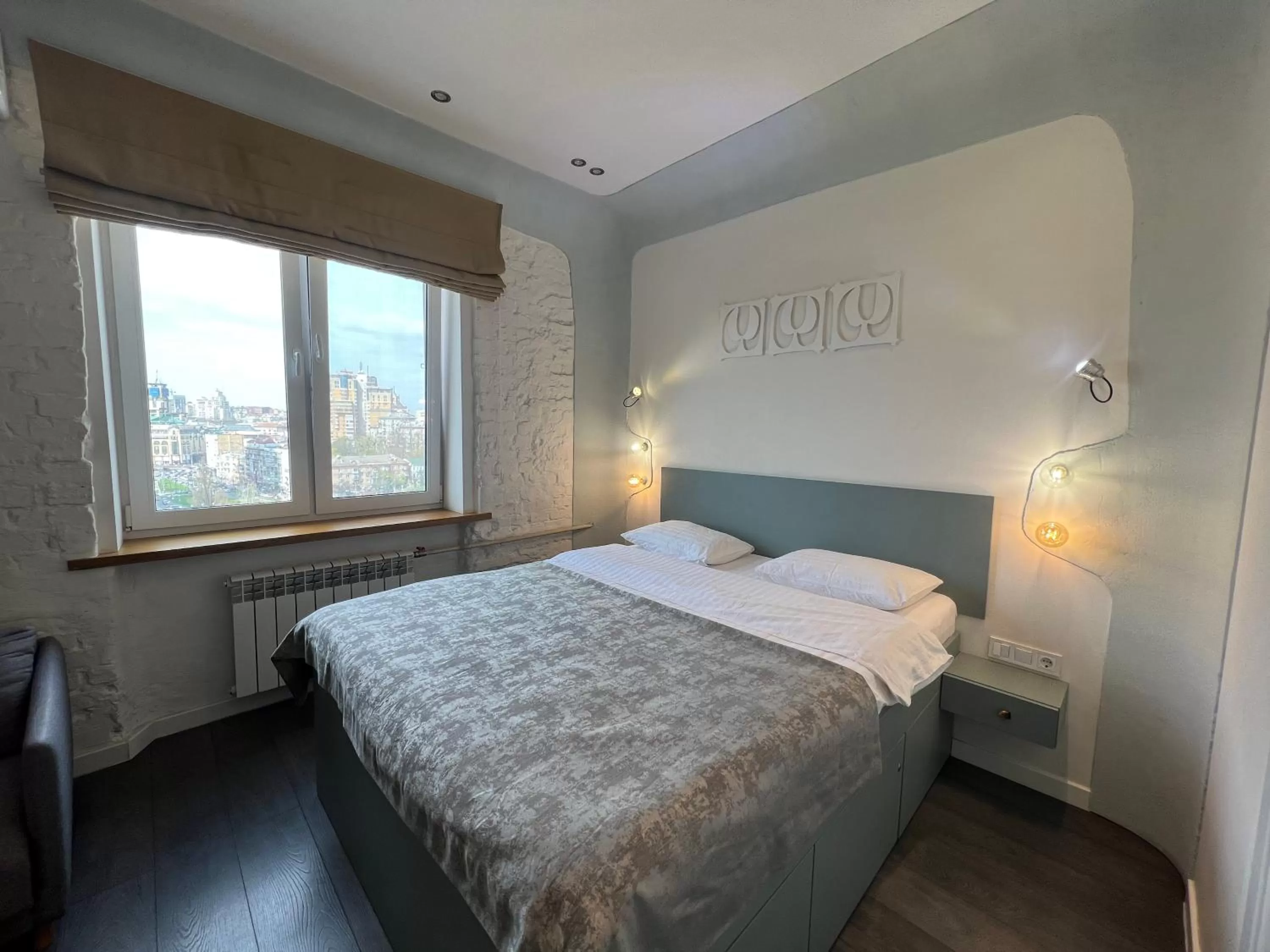 Bedroom, Bed in Kyiv Panorama Apartments near Gulliver