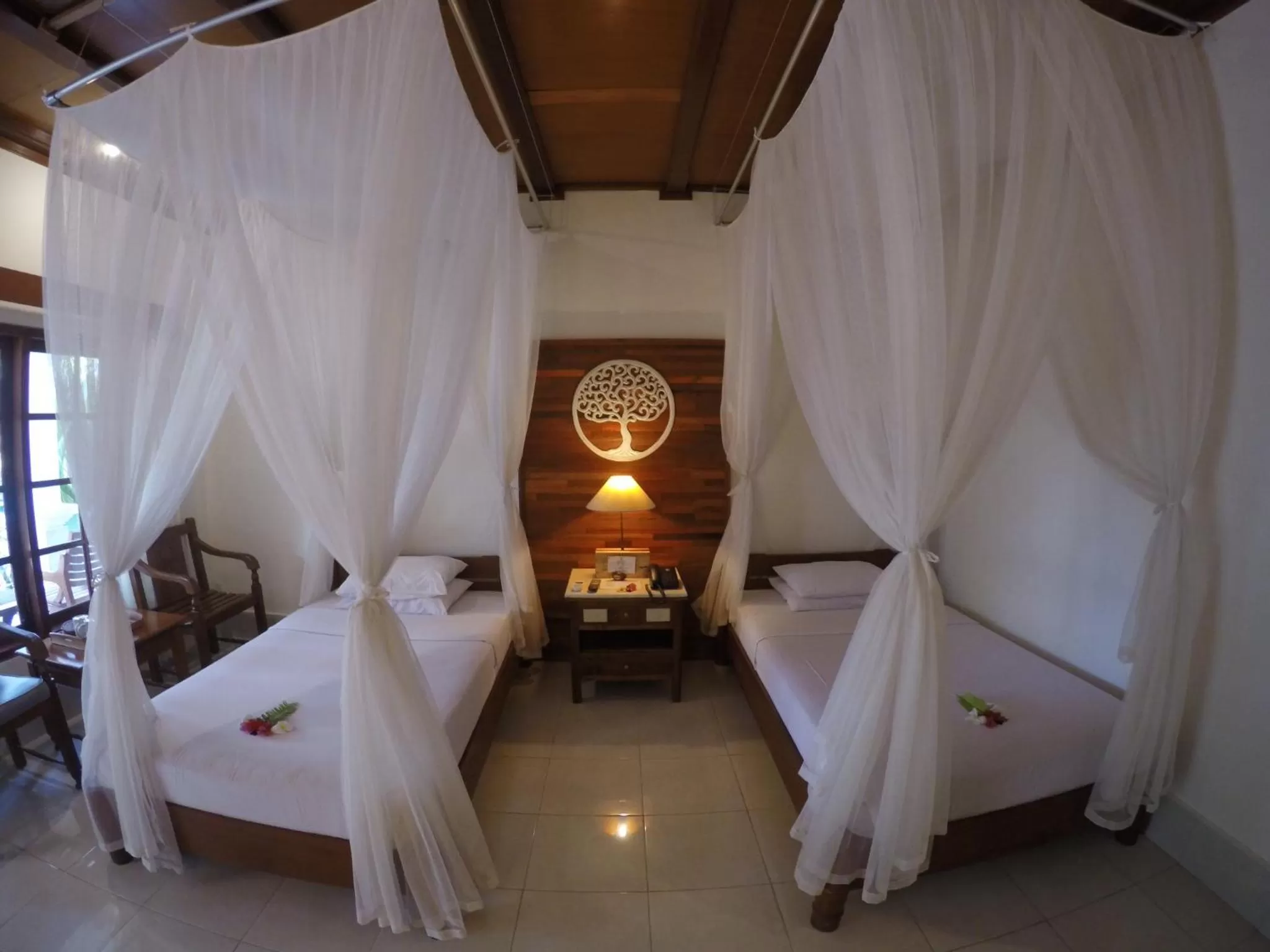 Photo of the whole room, Bed in Bumi Ayu Bungalow Sanur