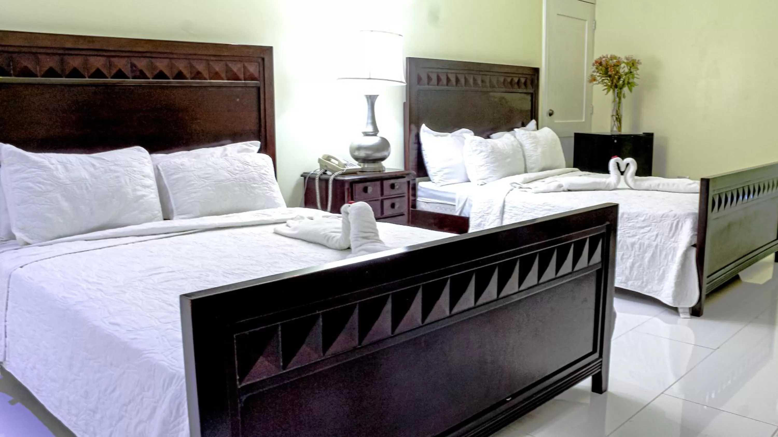 Bed in Golden House Hotel & Convention Center