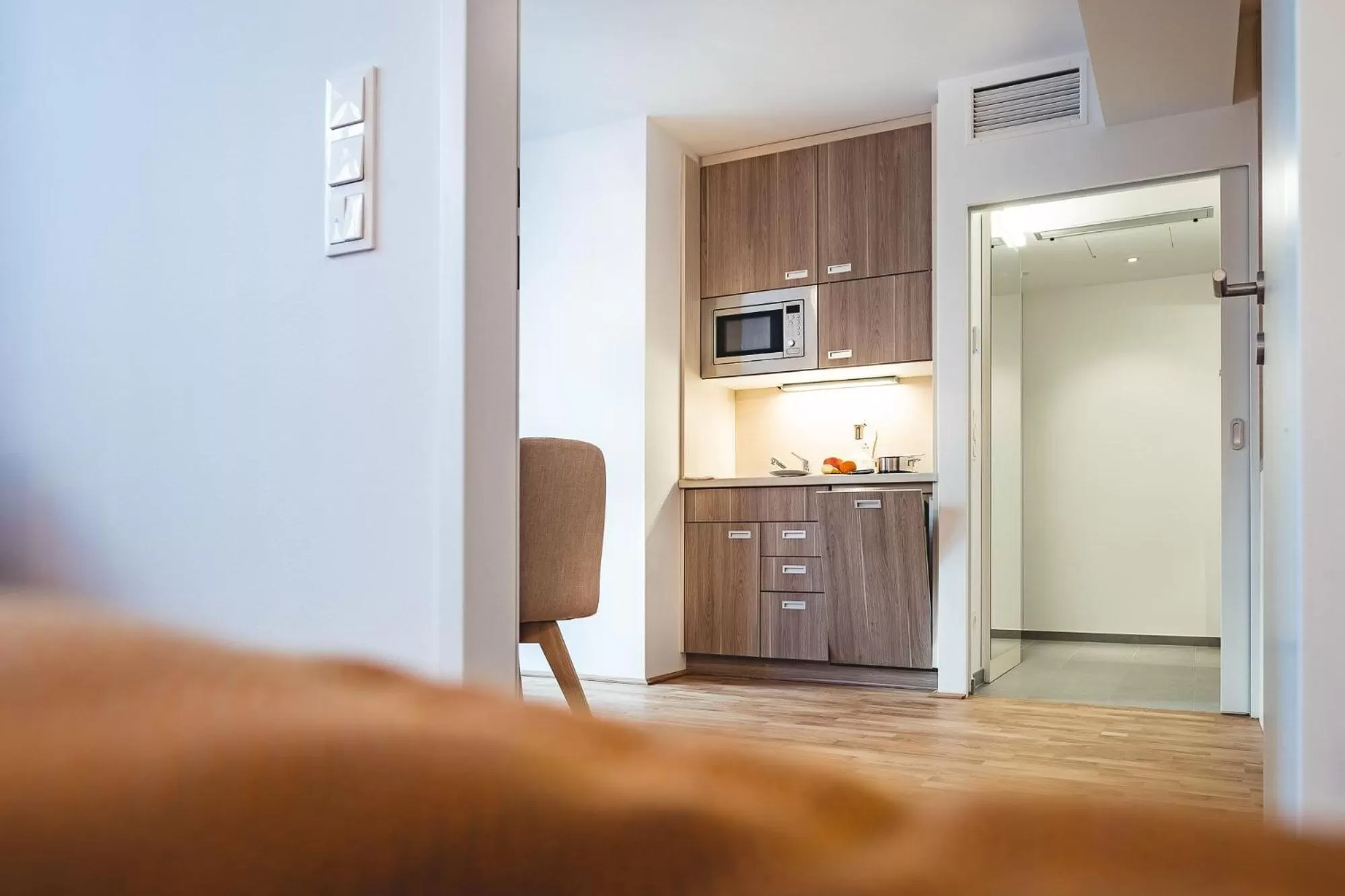 Kitchen or kitchenette in Oliver Apartments | contactless check-in