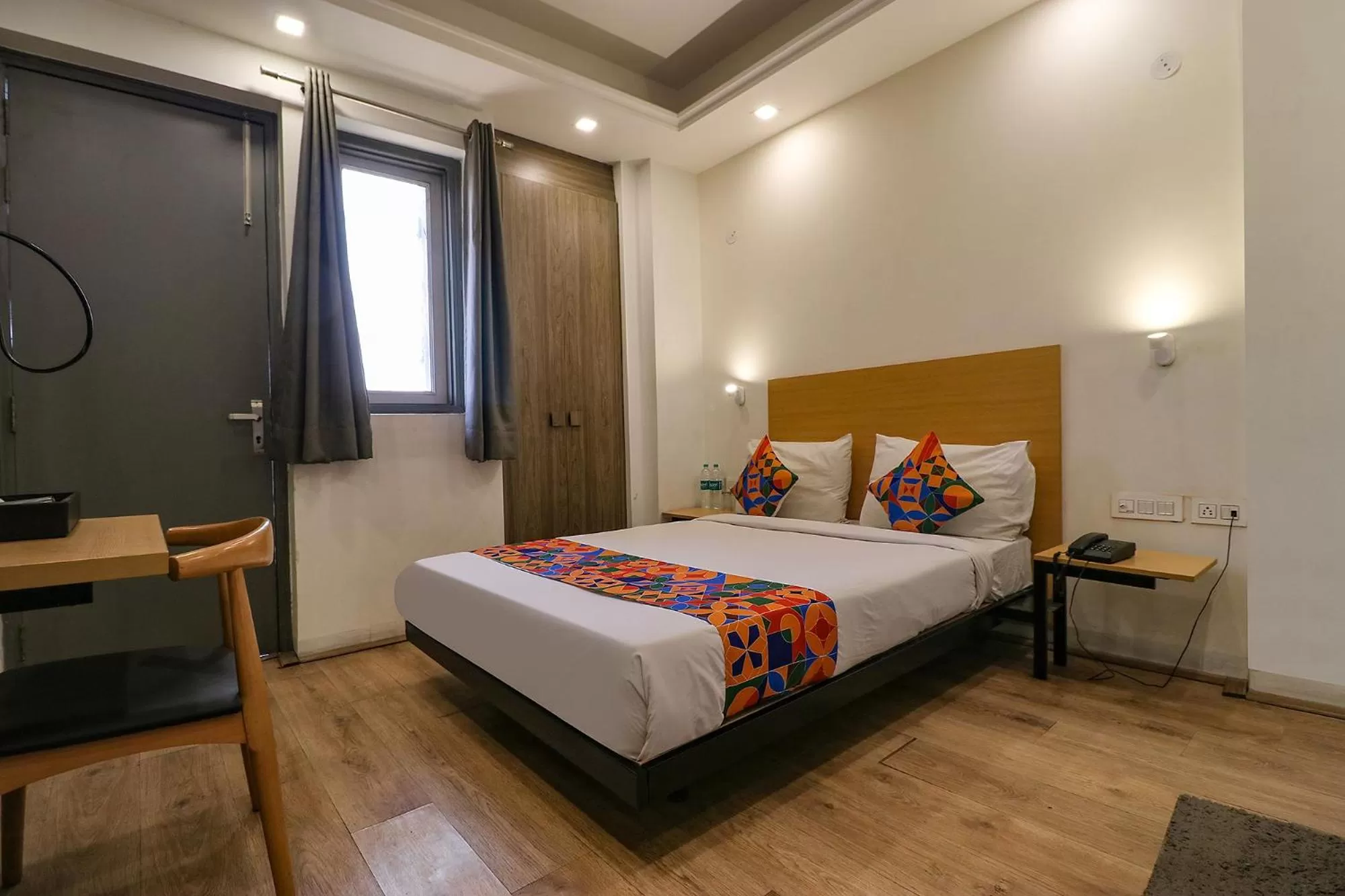 Photo of the whole room, Bed in FabHotel The Chaitanyas Rohini sec 18