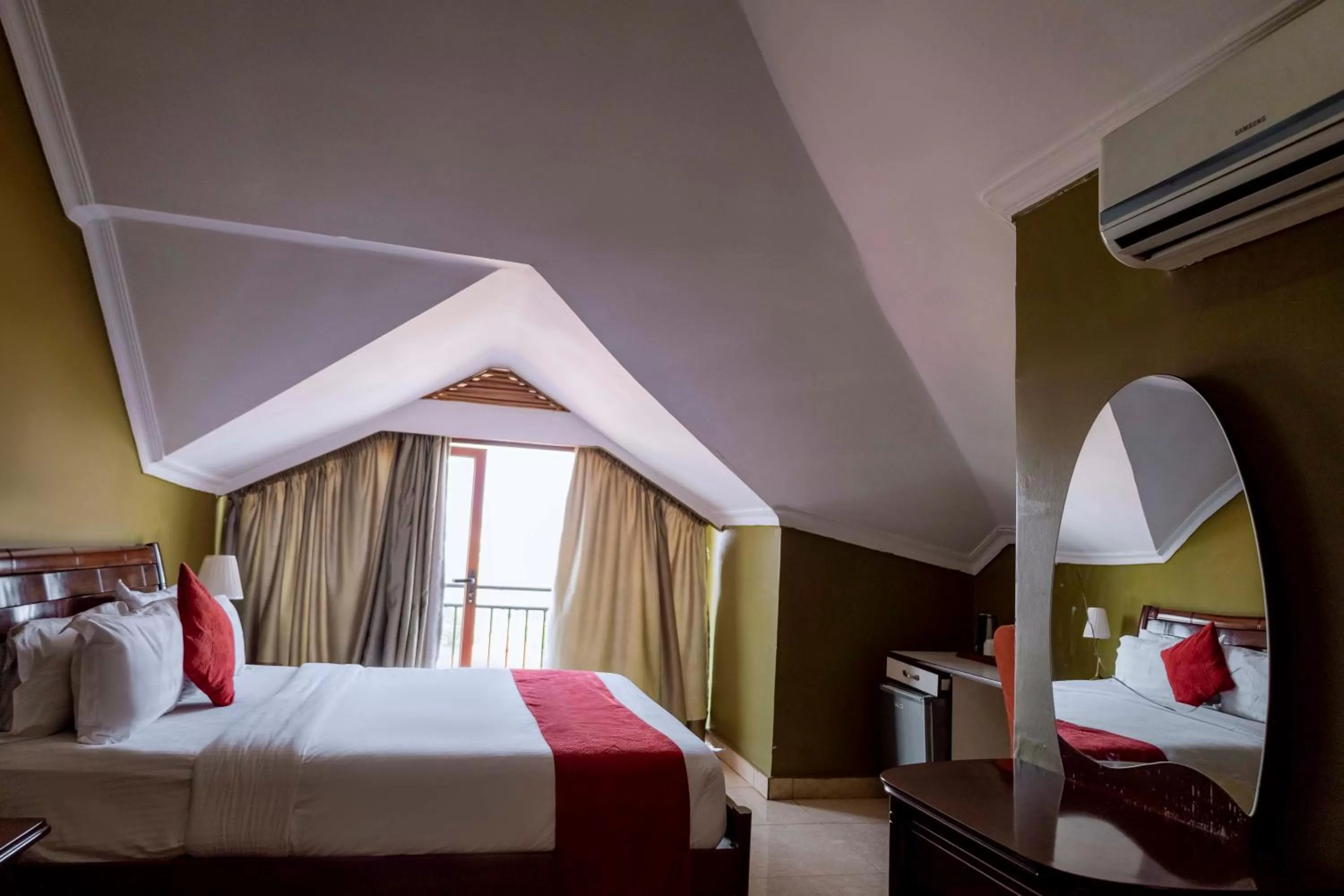 Bed in Legend Boutique Hotel