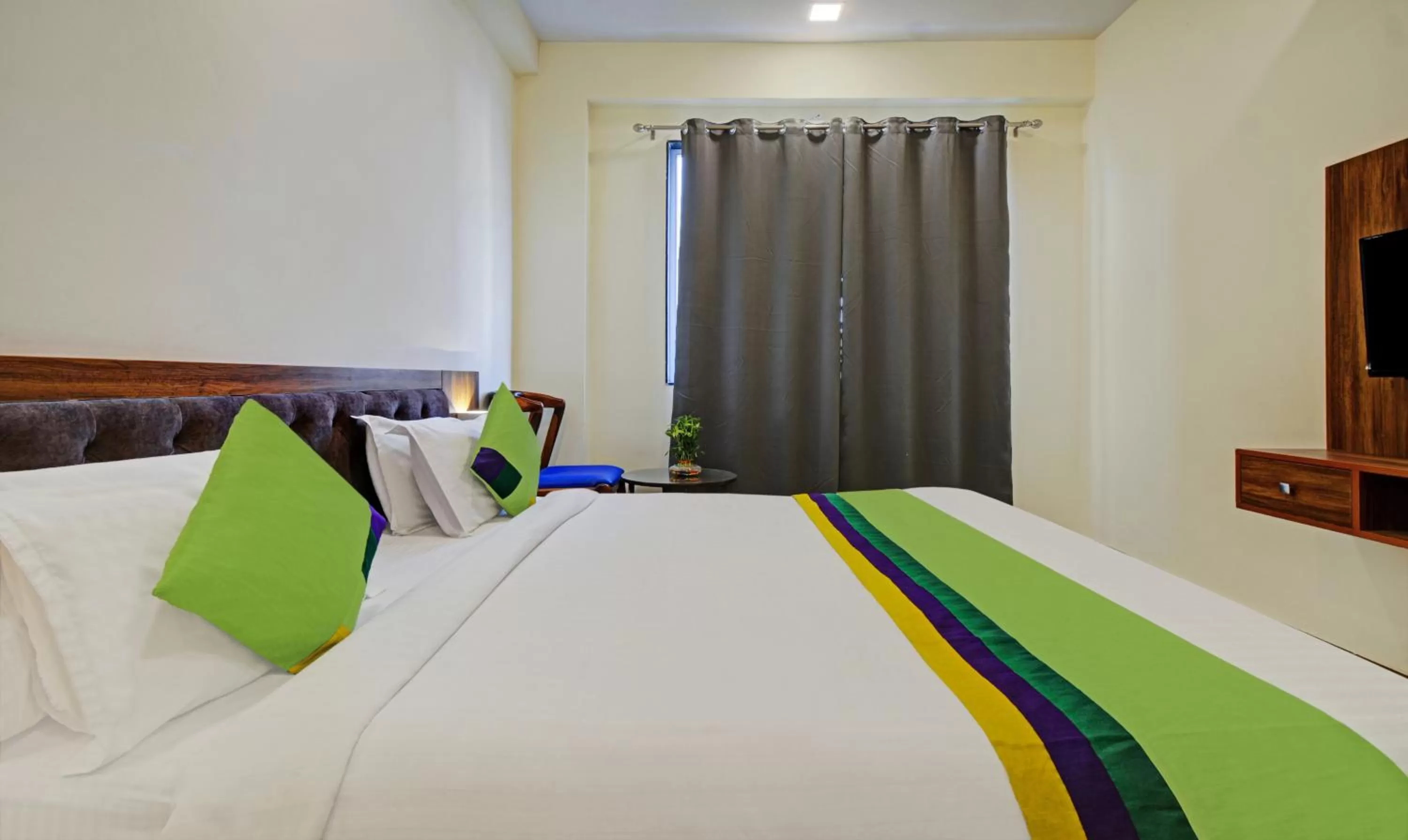 Bed in Tripli Hotels Le Shelton