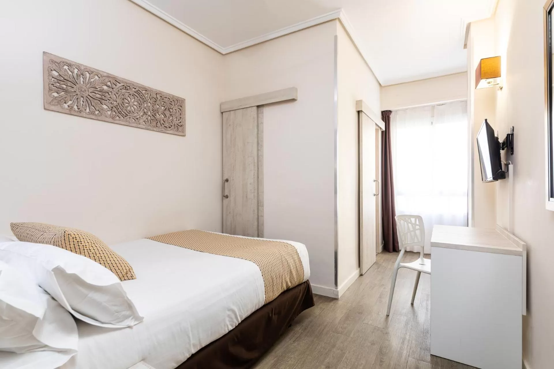 Bed in Sweet Hotel Continental