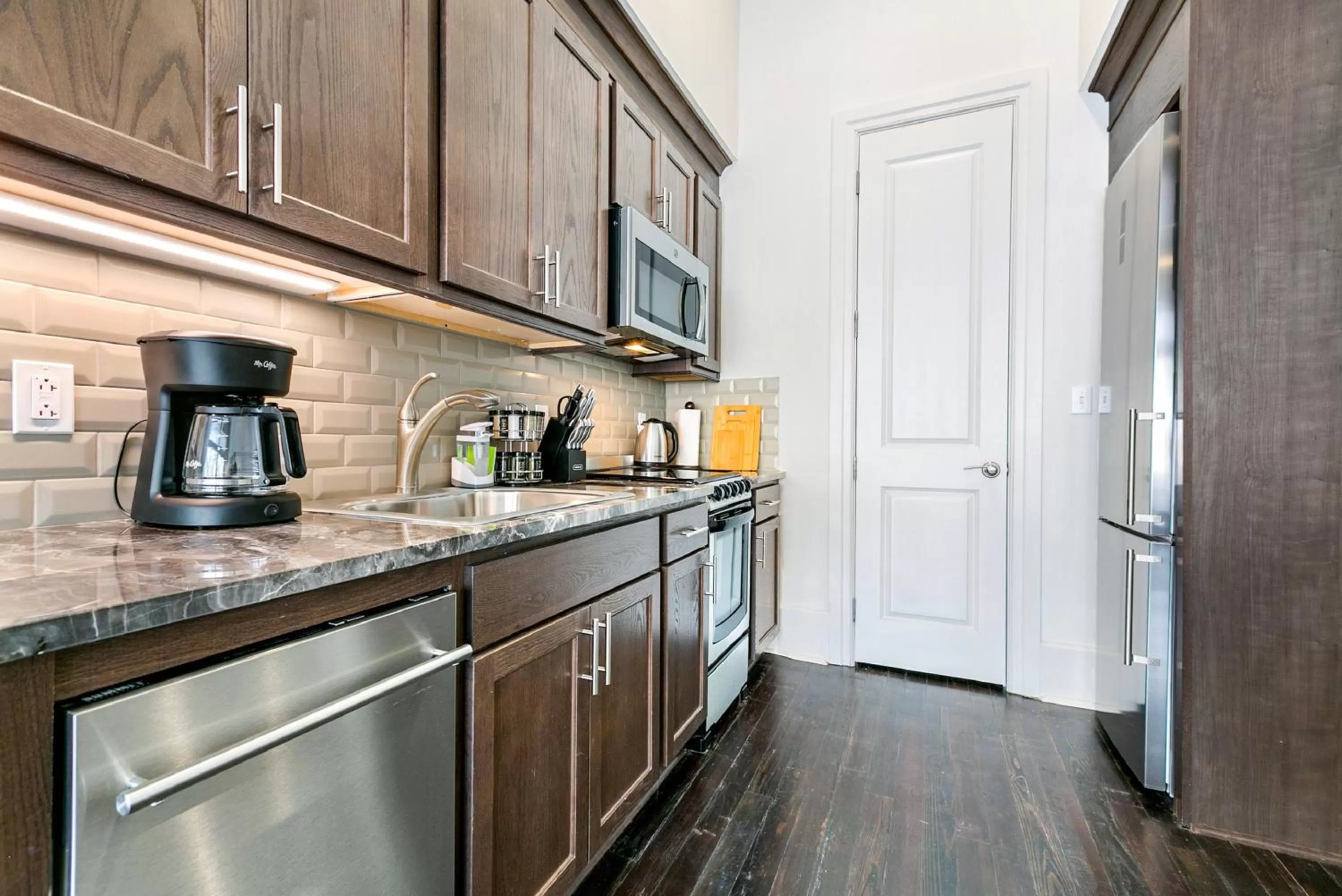 Kitchen or kitchenette in 1 and 2 BR Private Condos Steps Away From French Quarter