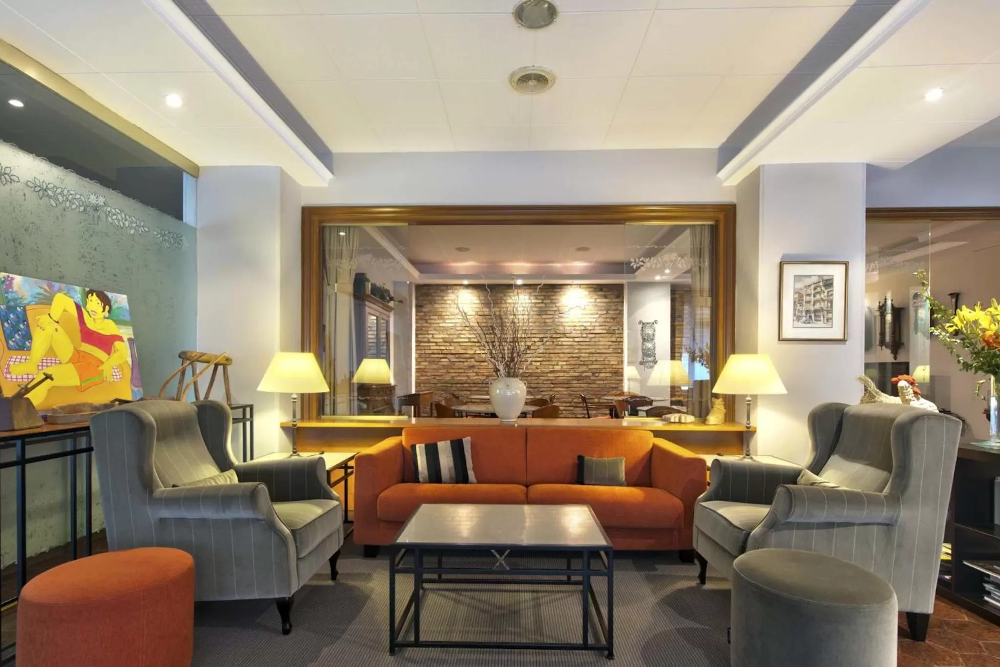 Communal lounge/ TV room in Hotel Restaurant Pessets & SPA