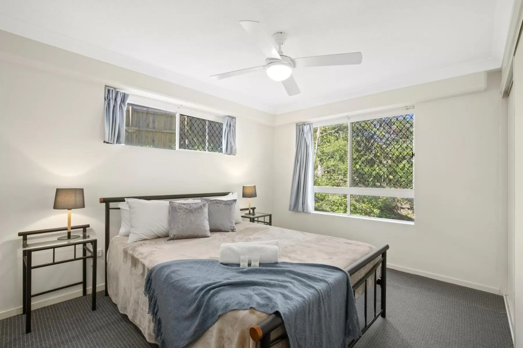 Bed in Kirra Palms Holiday Apartments