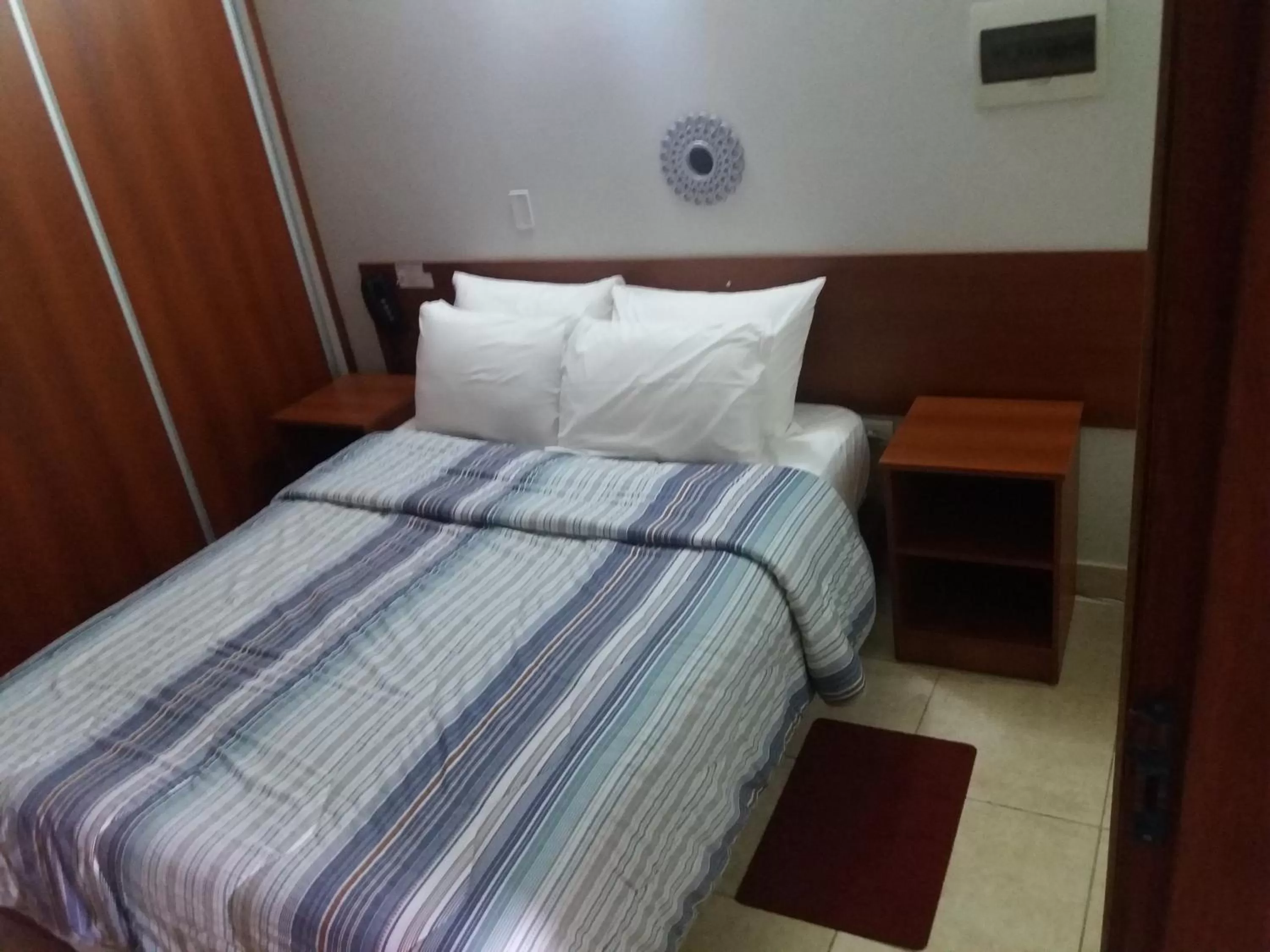 Bed in Madame Lynch Hotel Asuncion