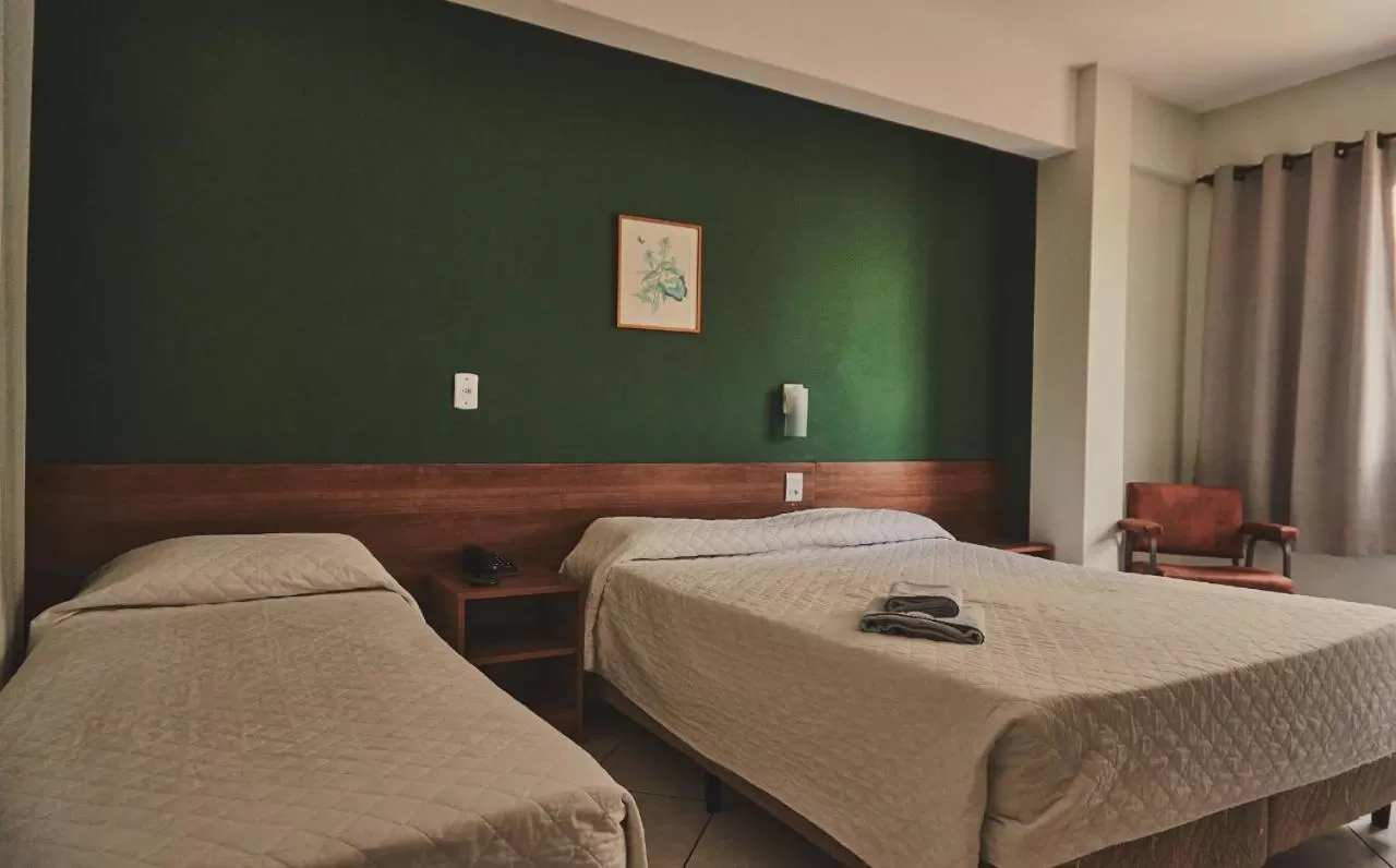 Bed in Hotel Dom Rafael Express