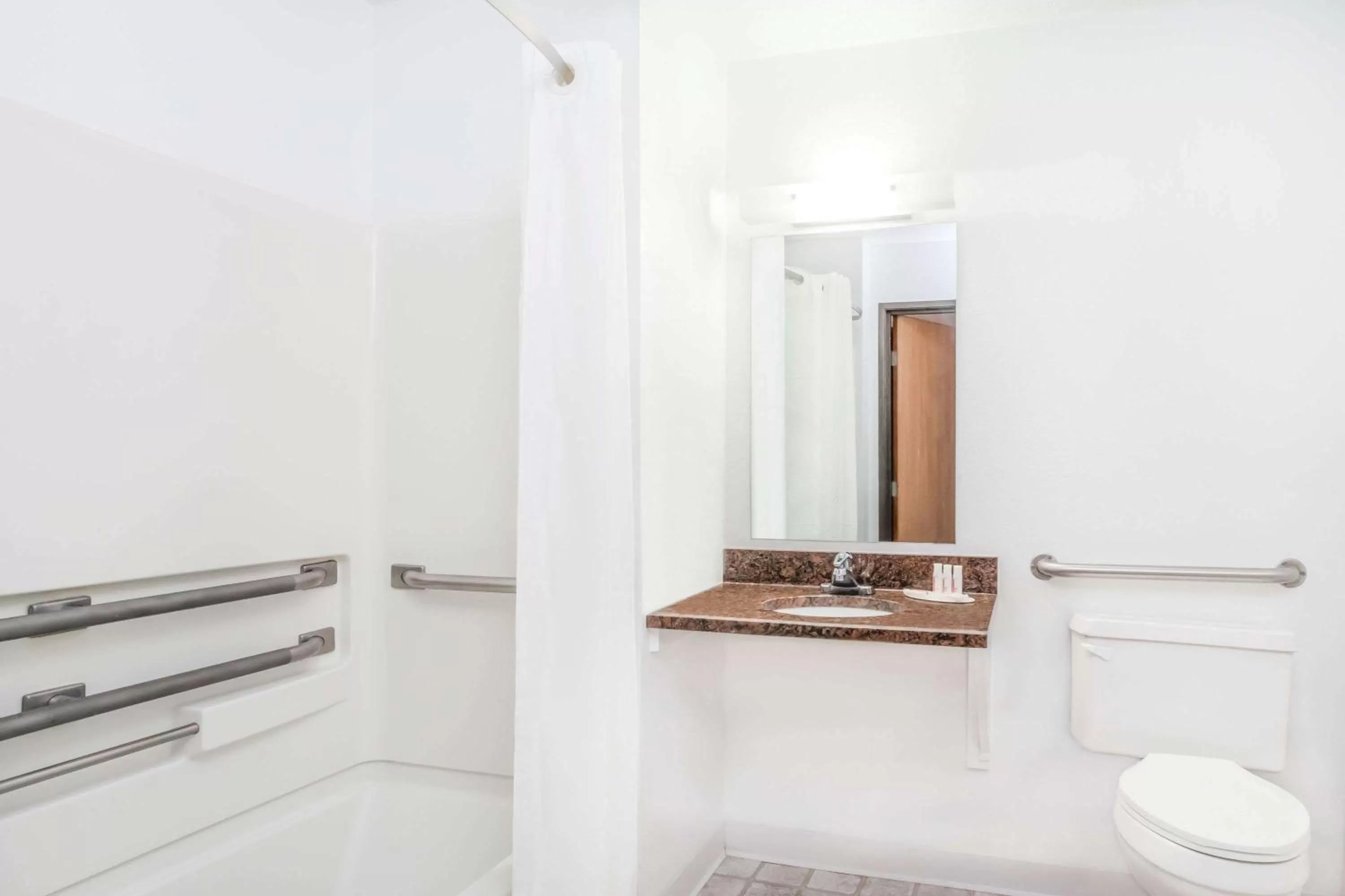 Bathroom in Super 8 by Wyndham Montgomery Maybrook