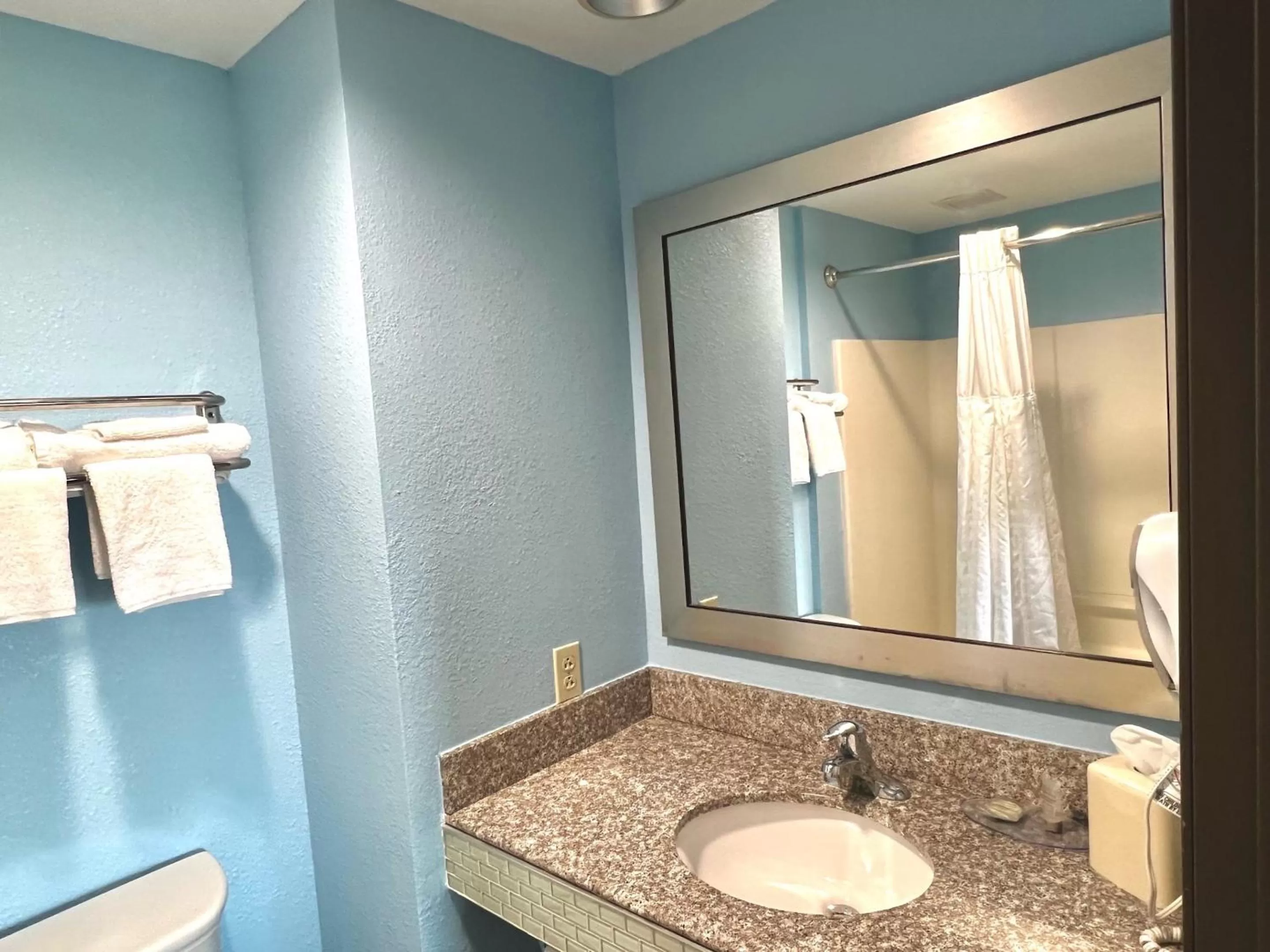 Bathroom in HomeTowne Studios & Suites by Red Roof Washington