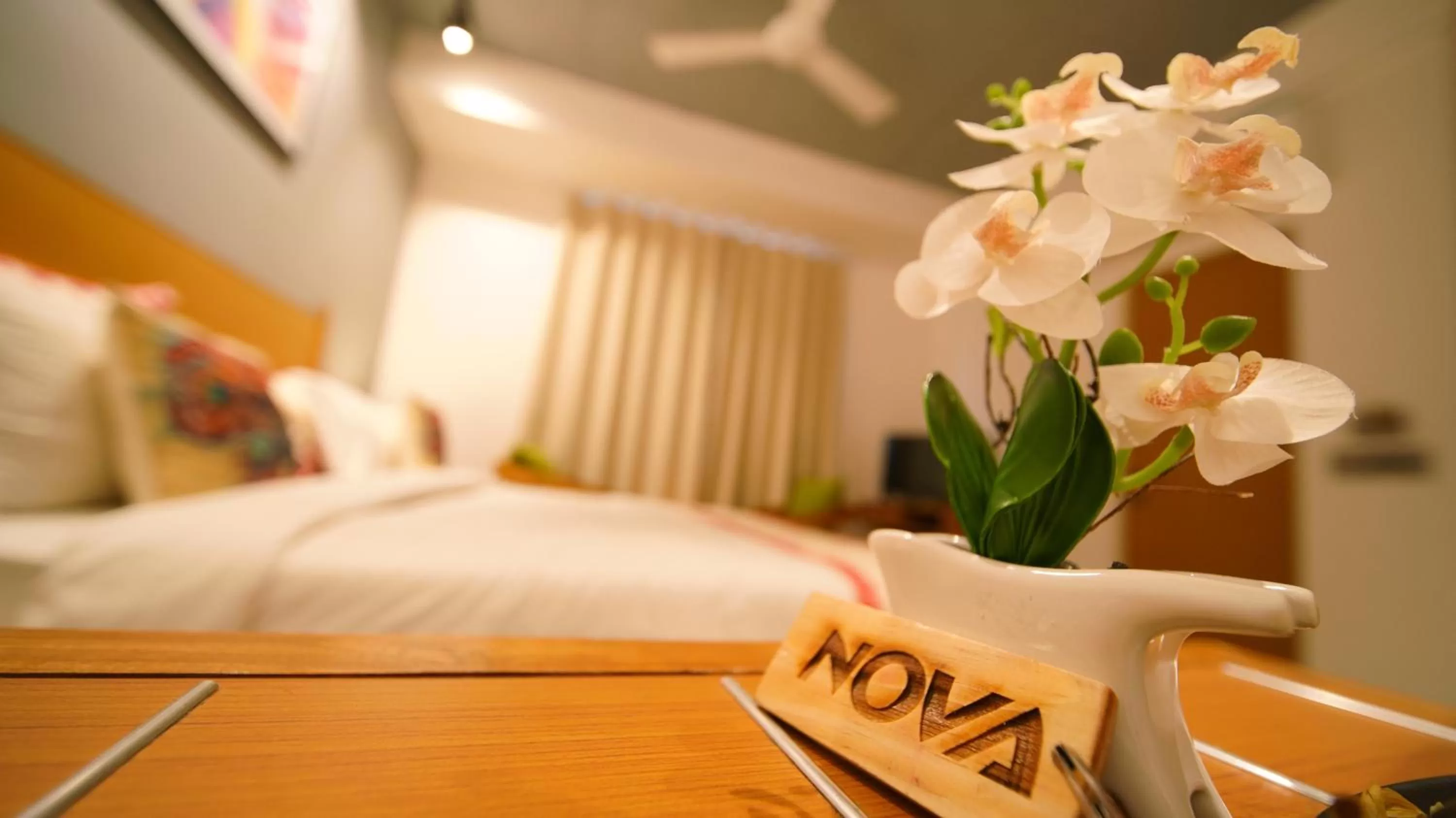 Text overlay, Bed in Hotel Nova Boutique