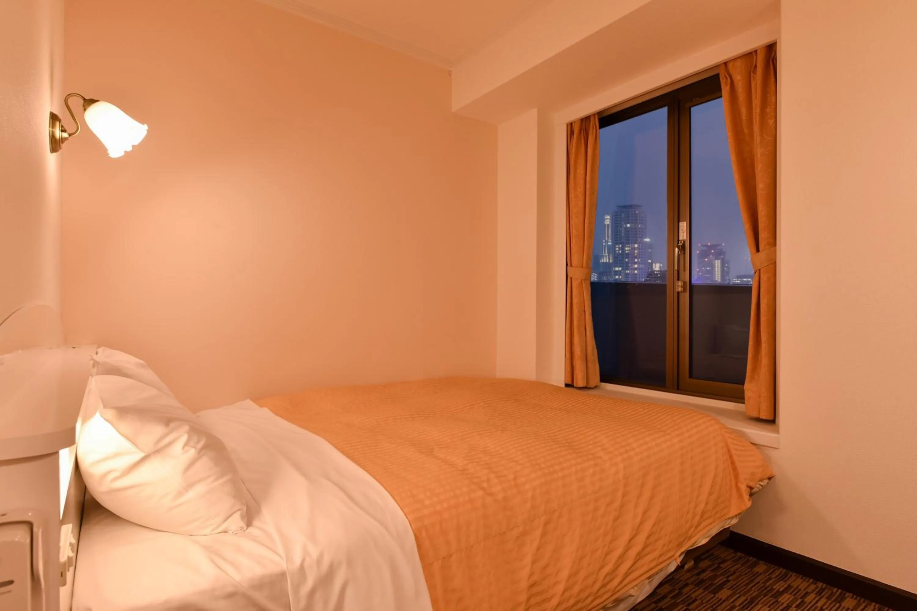 Bed in Kobe Sannomiya Union Hotel