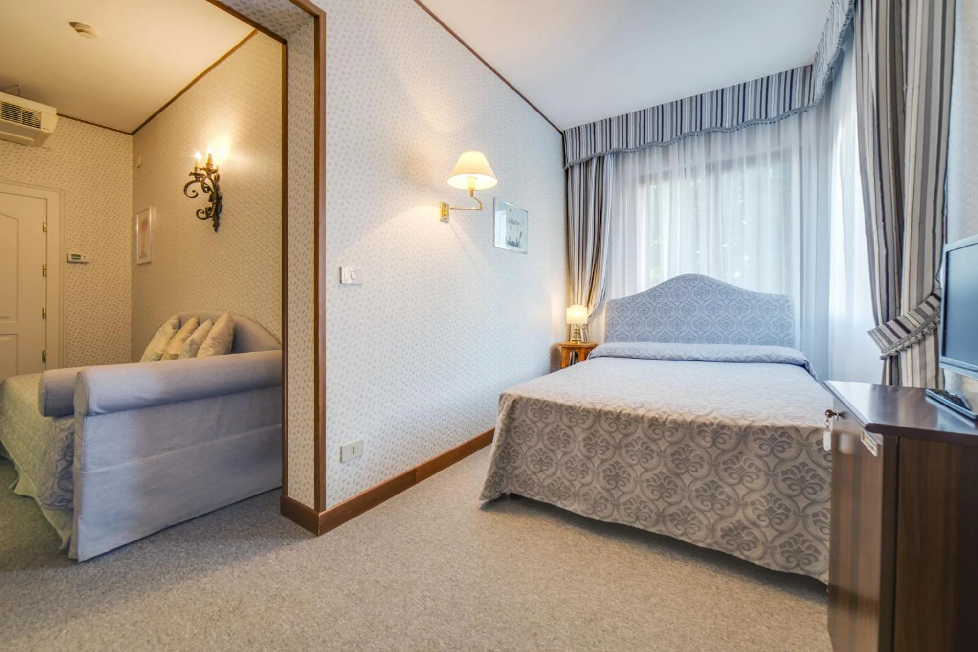 Bed in Hotel La Meridiana