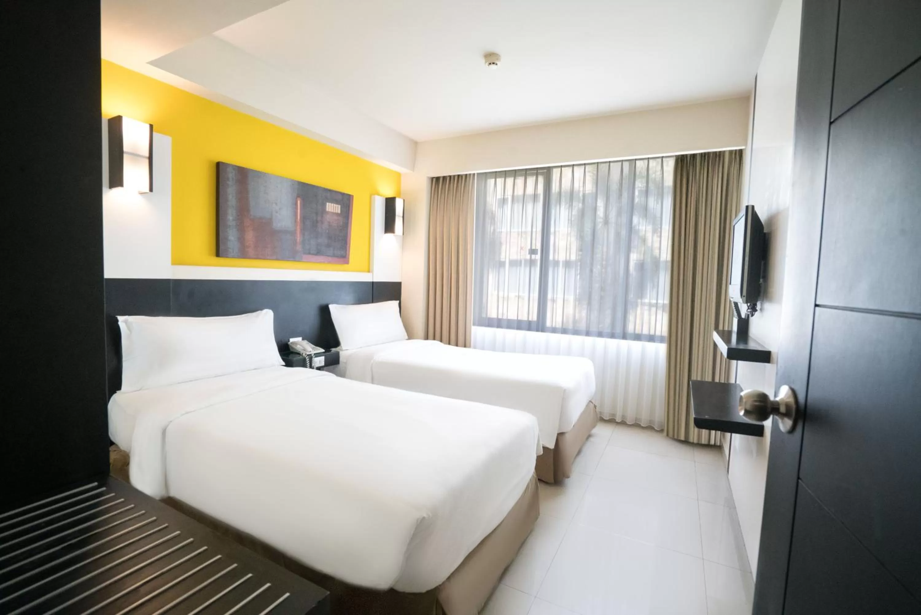 Bed in Aston Denpasar Hotel & Convention