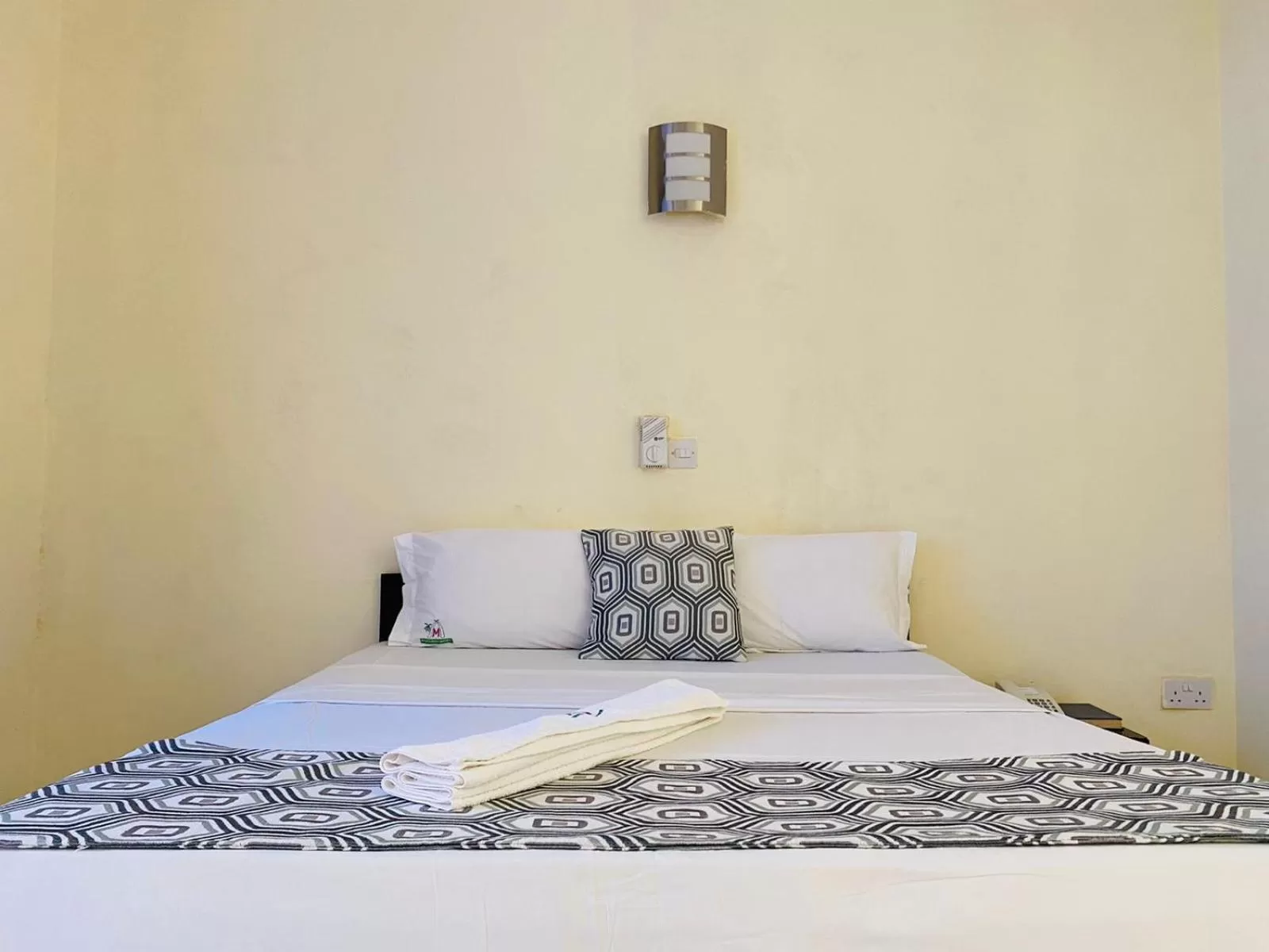 Bed in Merry Villa Hotel & Apartments
