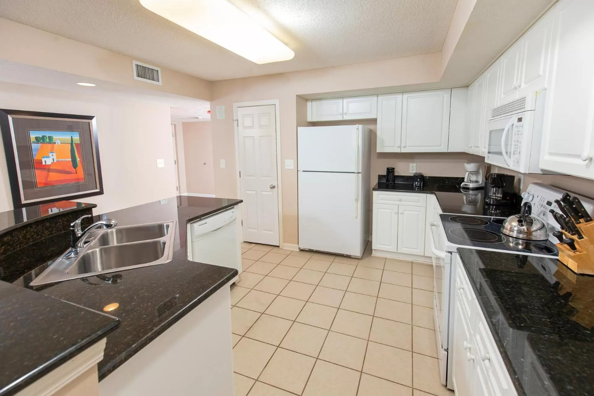 Kitchen or kitchenette in Barefoot Resort Golf & Yacht Club Villas
