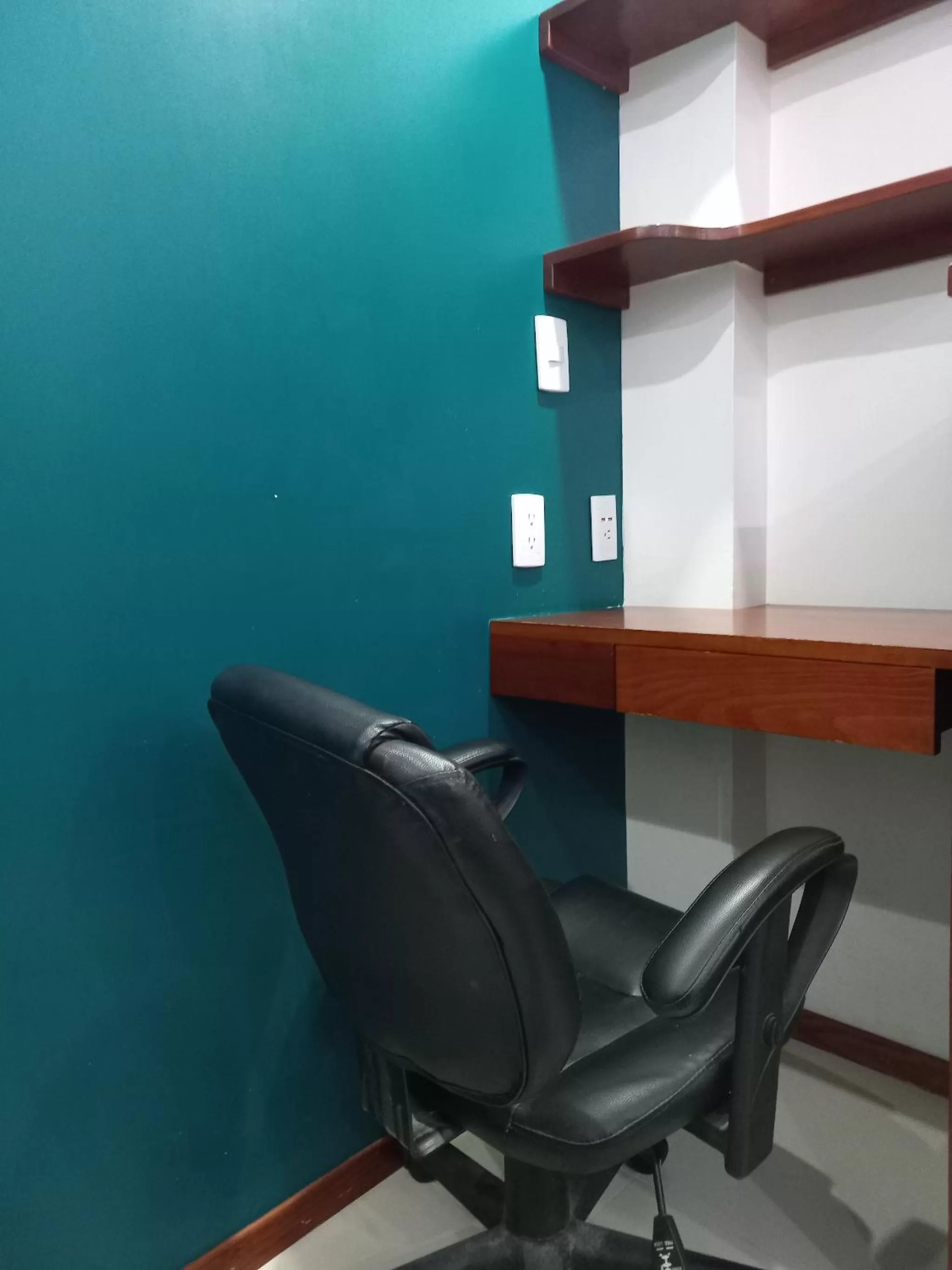 Seating area in La Aurora Hotel Like Home