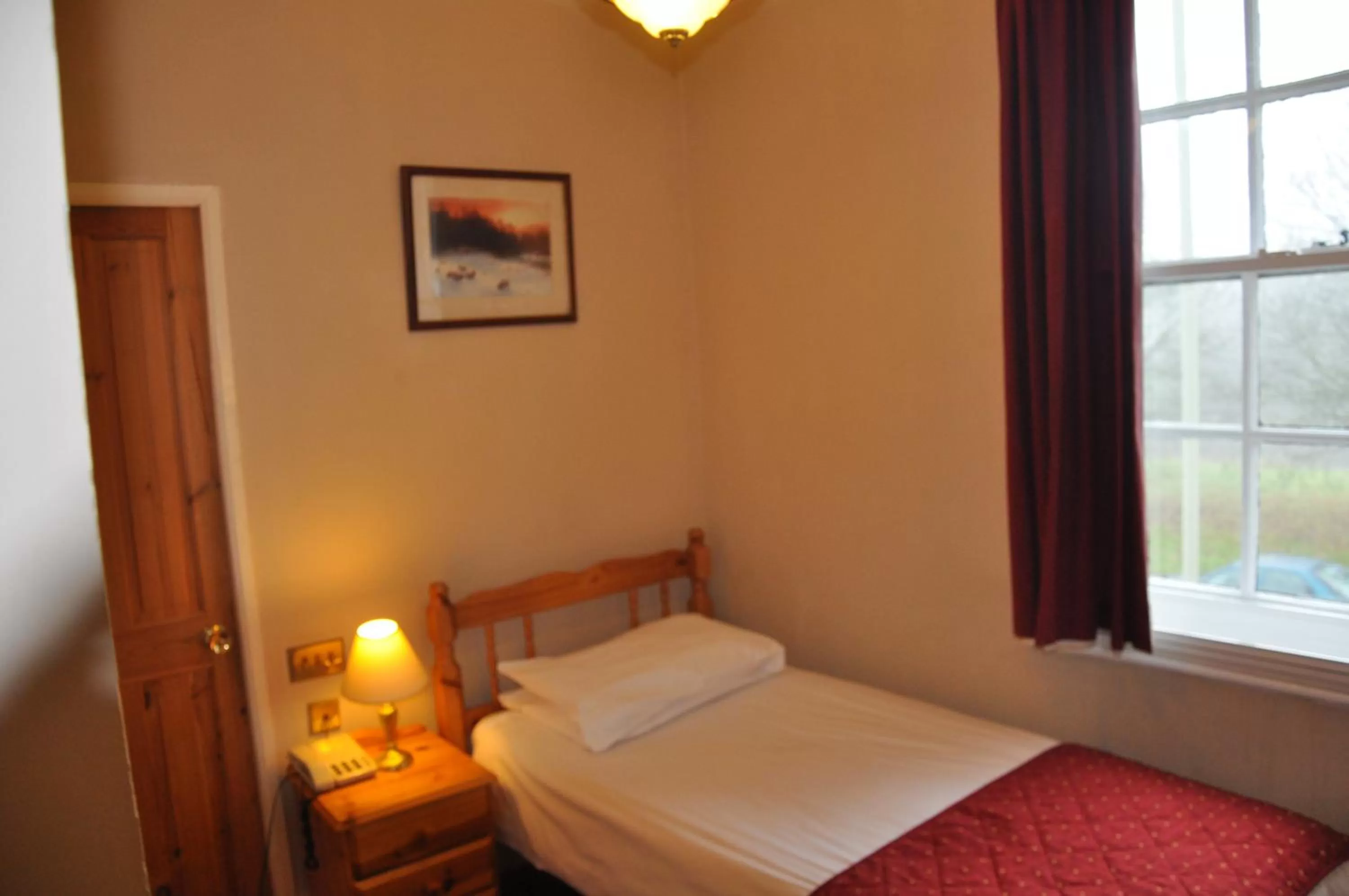 Bed in The Roundabout Hotel