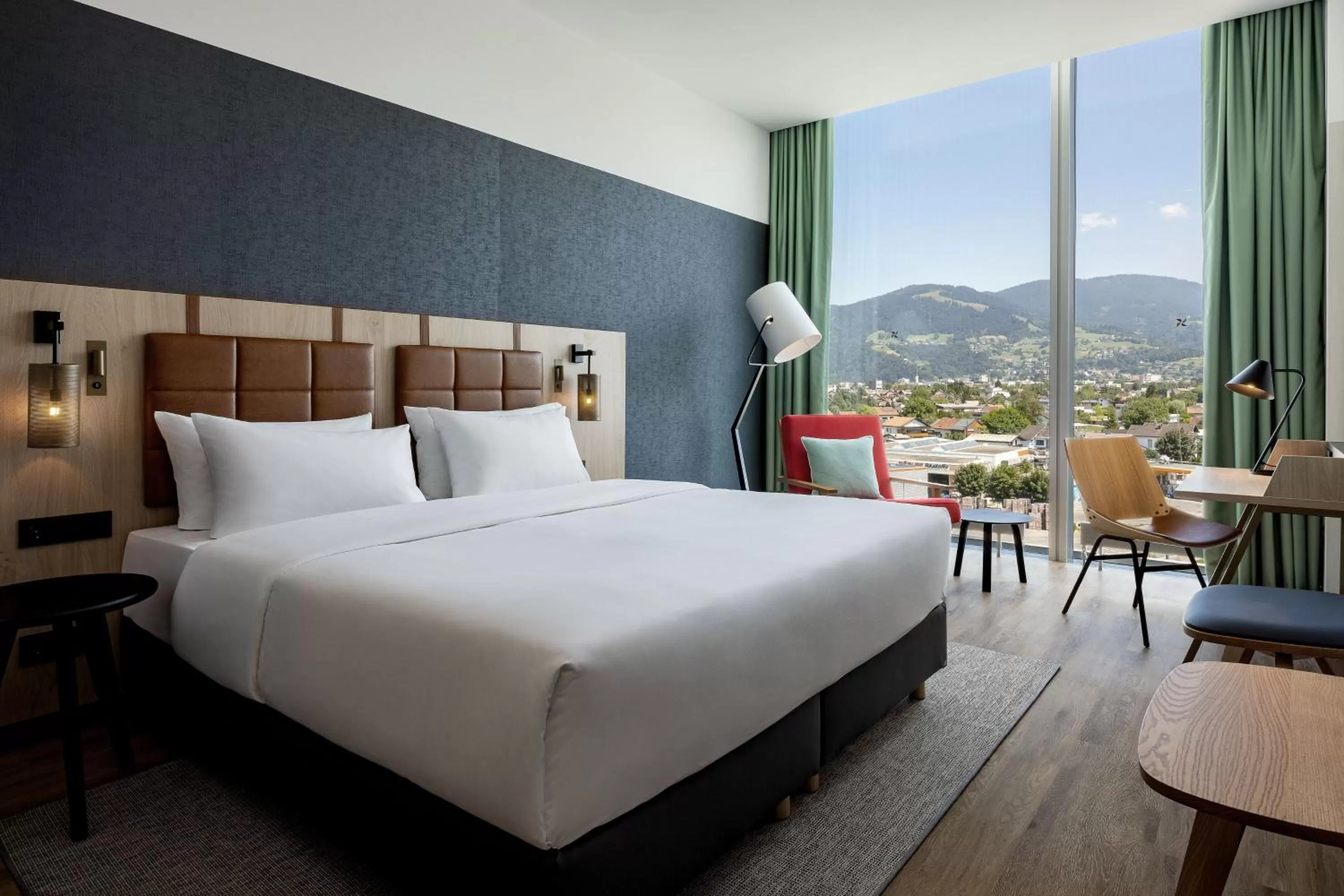 Photo of the whole room, Bed in Four Points by Sheraton Panoramahaus Dornbirn
