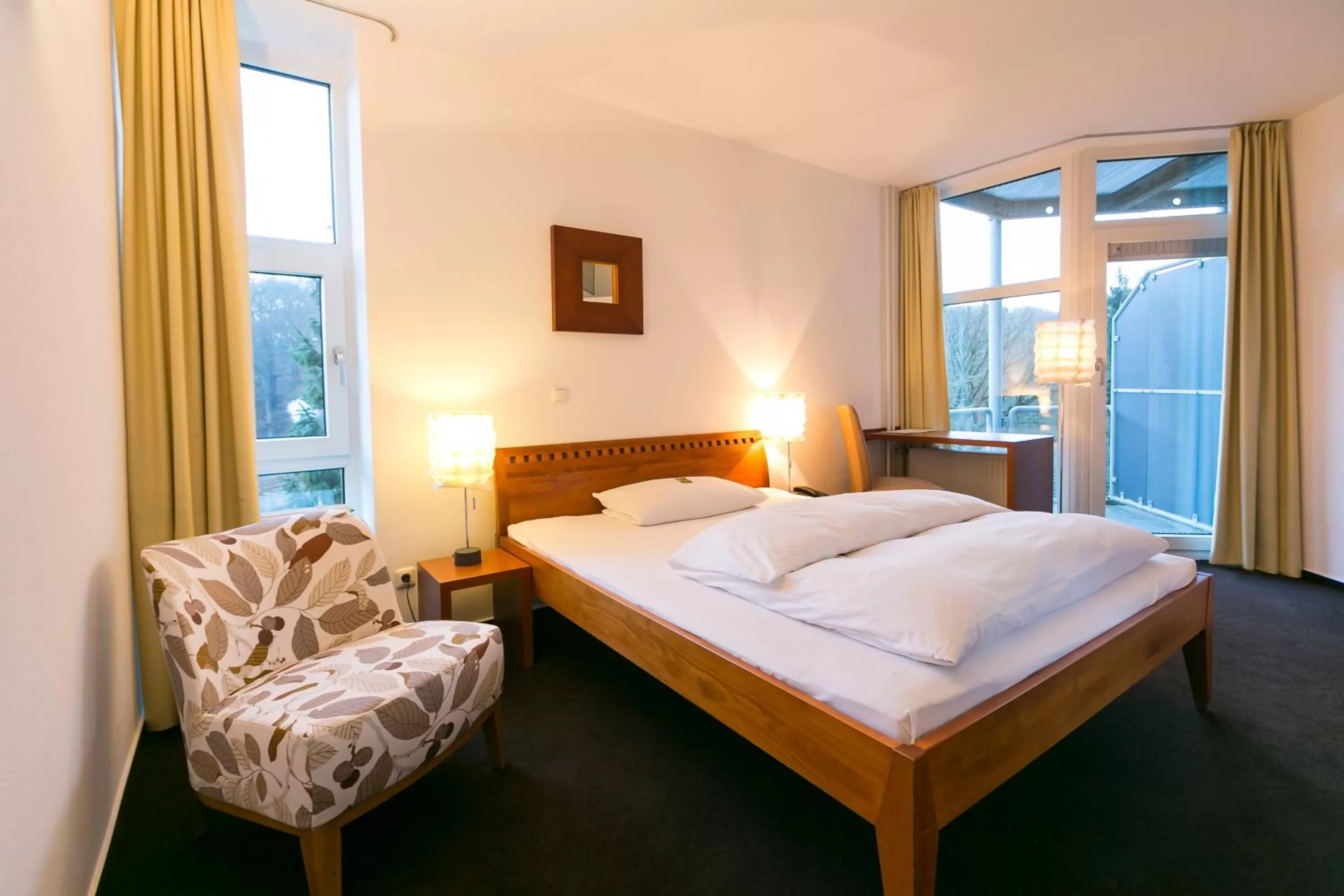 Photo of the whole room, Bed in Wald & Golfhotel Lottental
