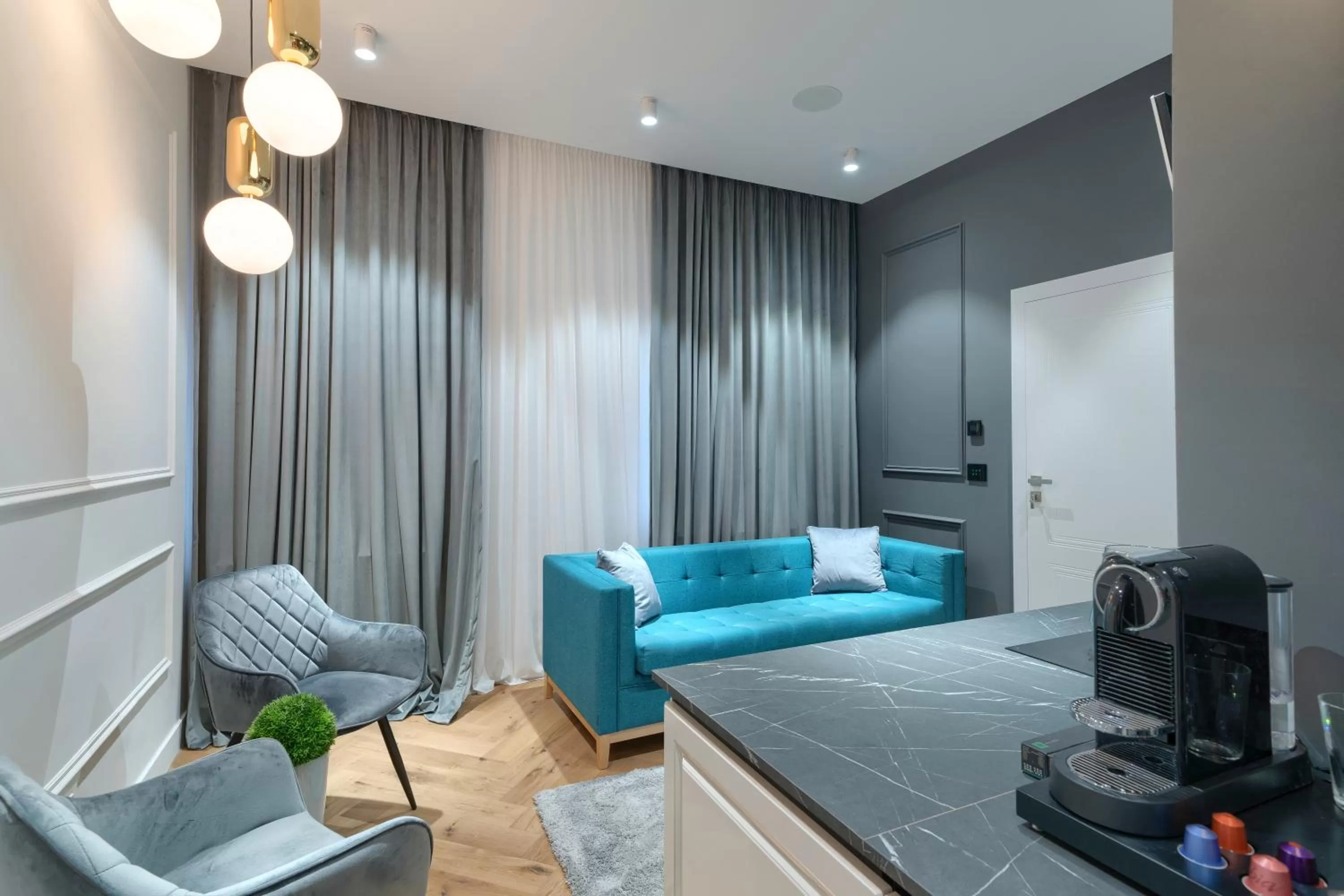 Living room, Bed in Elysium Residence