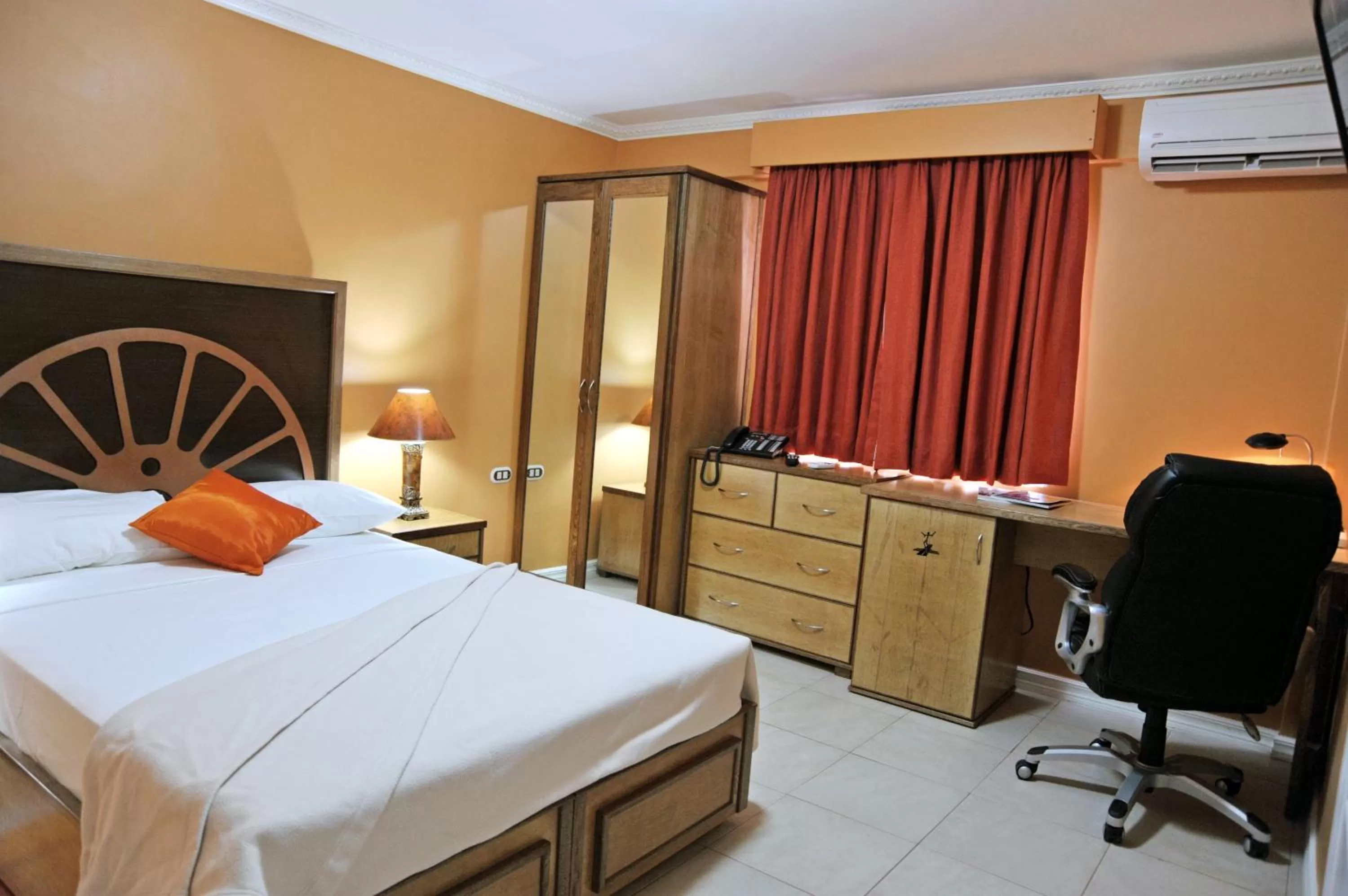 Bed in Culture Crossroads Inn