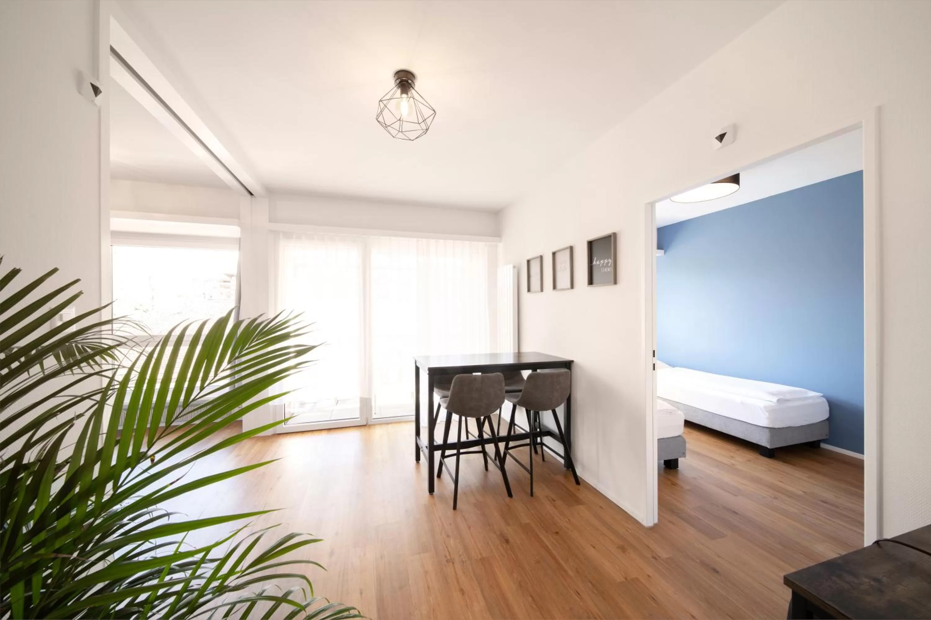 Living room, Bed in Hotel by Hyve Basel