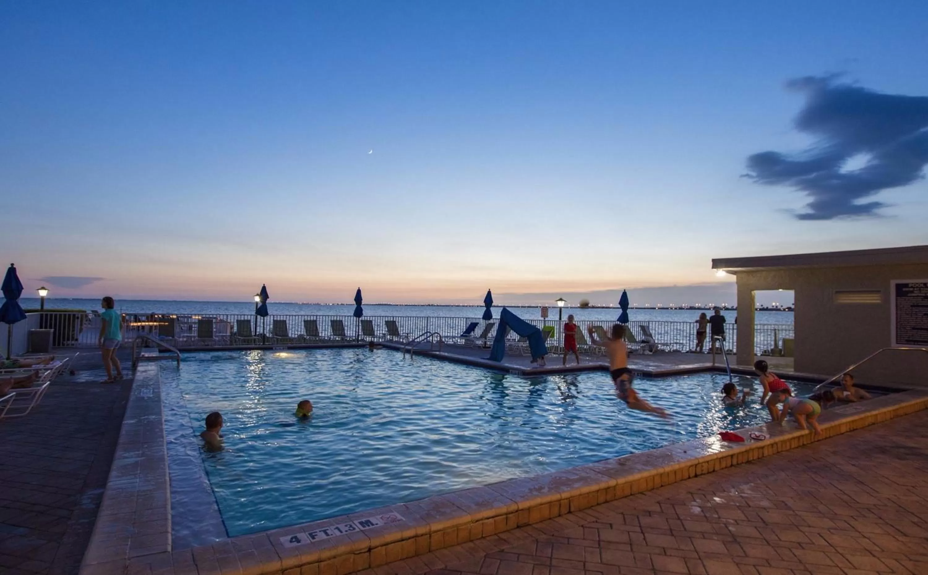 Swimming Pool in 2 Bed Condo with Balcony Facing Pool and Sunsets!