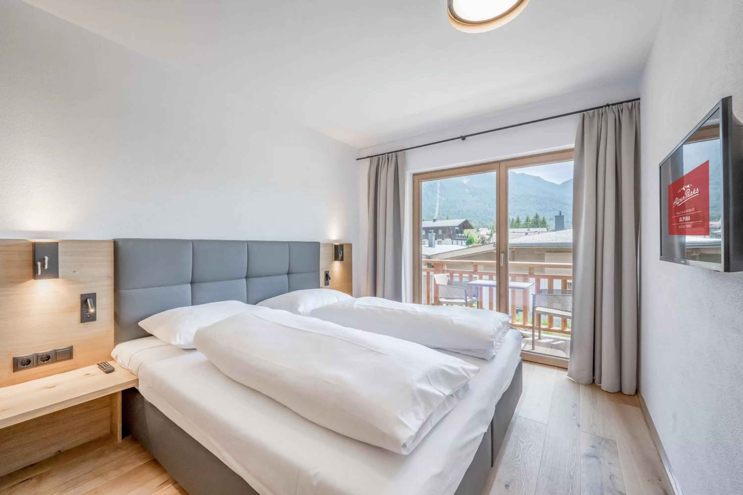 TV and multimedia, Bed in AlpenParks Chalet & Apartment Alpina Seefeld