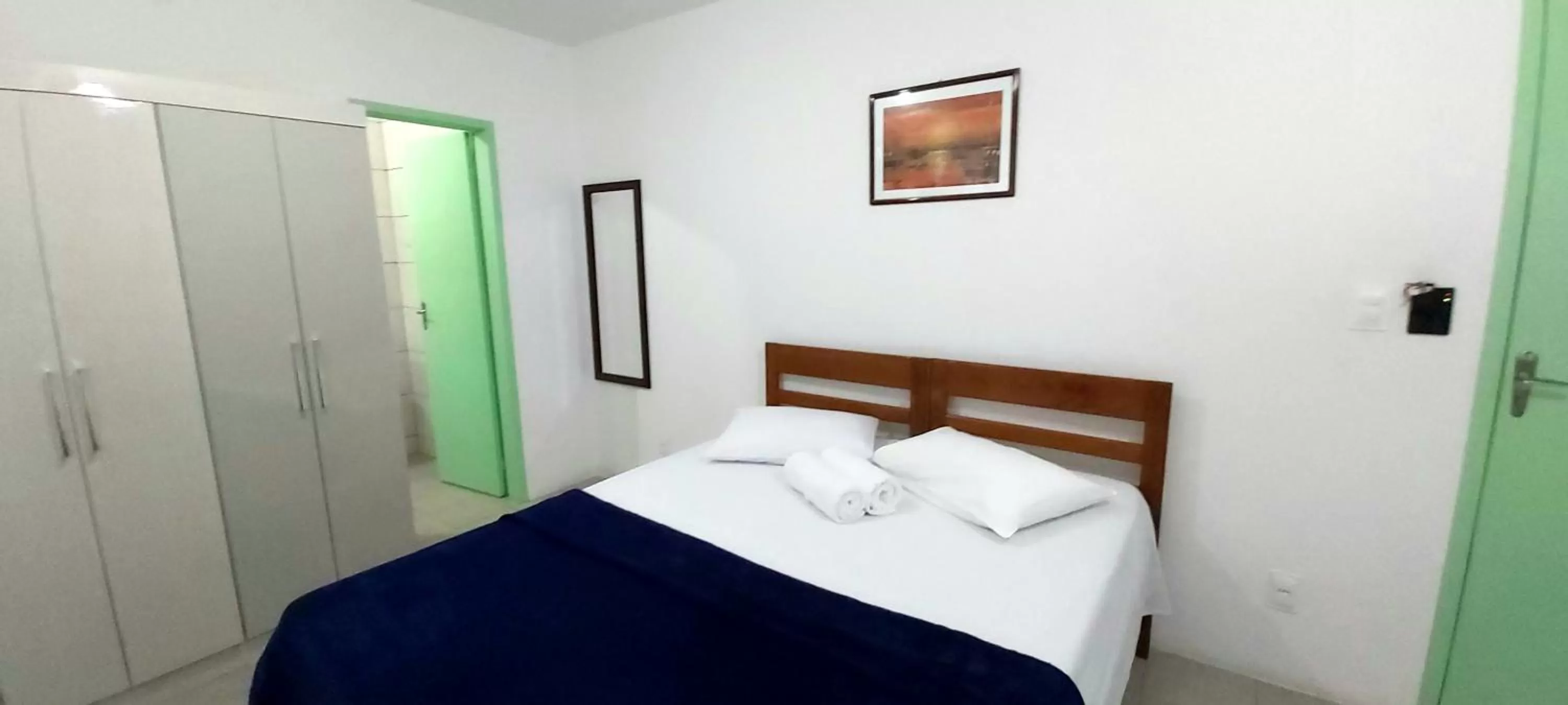 Bed in Pousada Milani