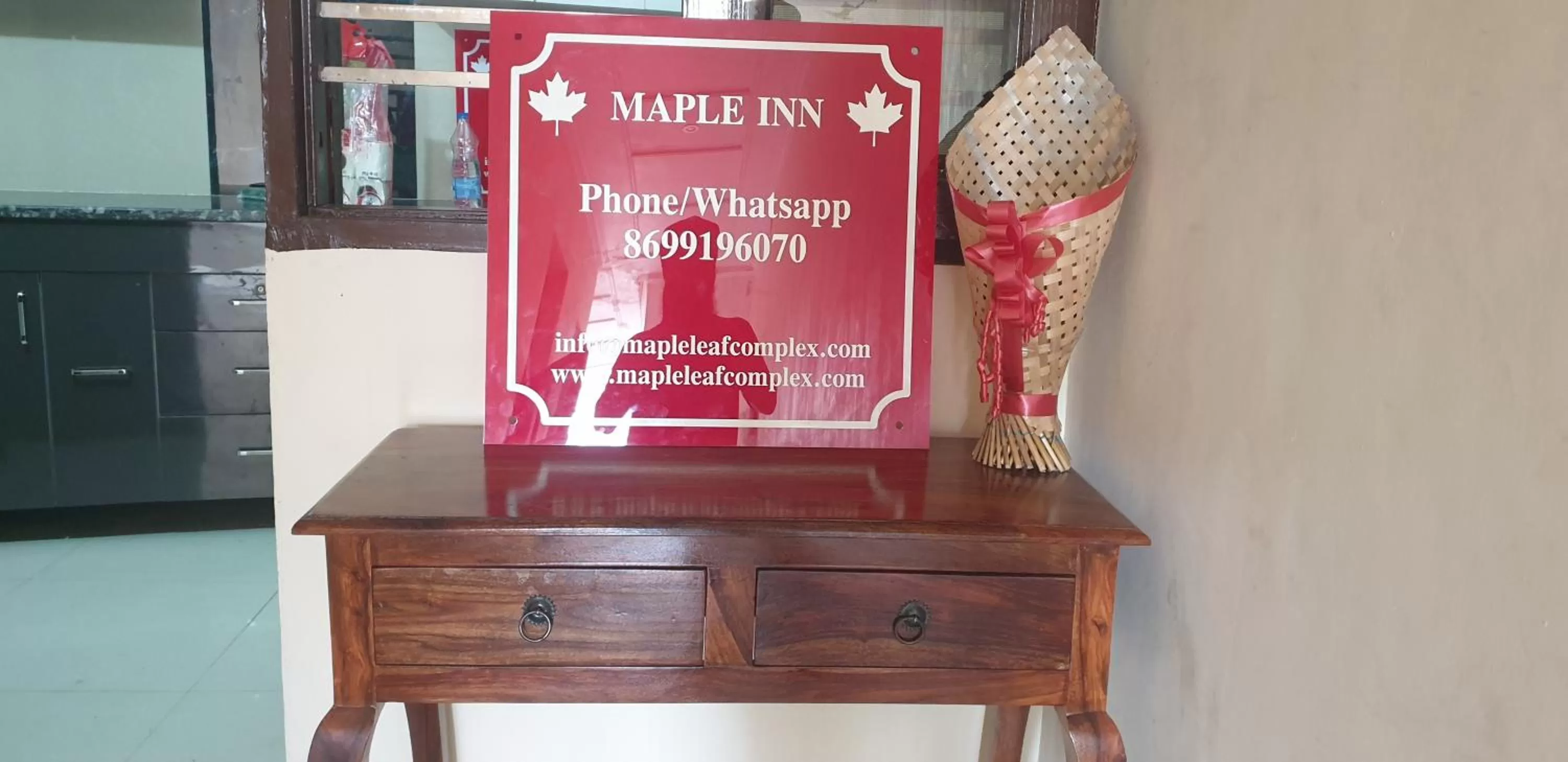 Property logo or sign in Maple Leaf Hotel