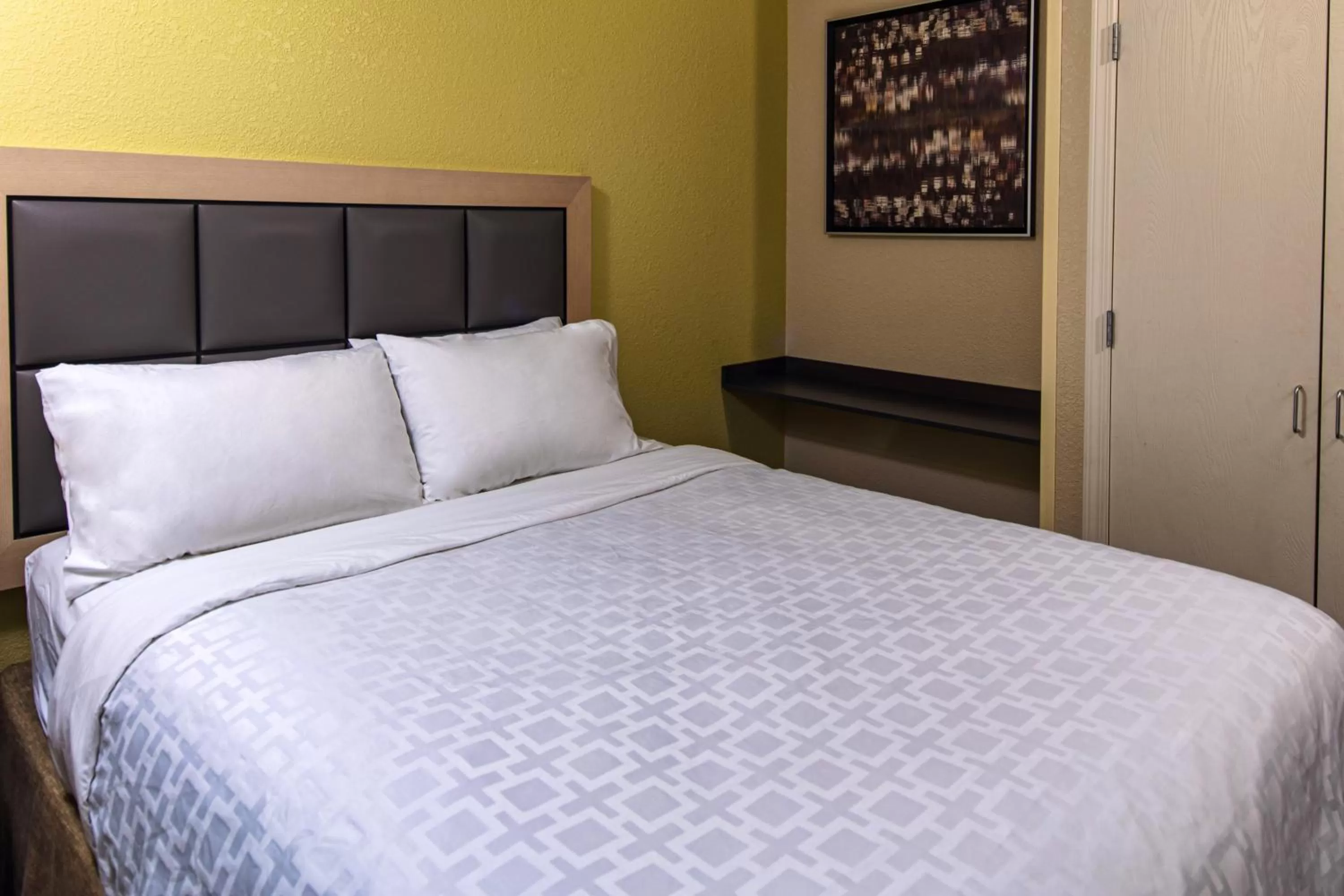 Bed in Candlewood Suites Appleton by IHG