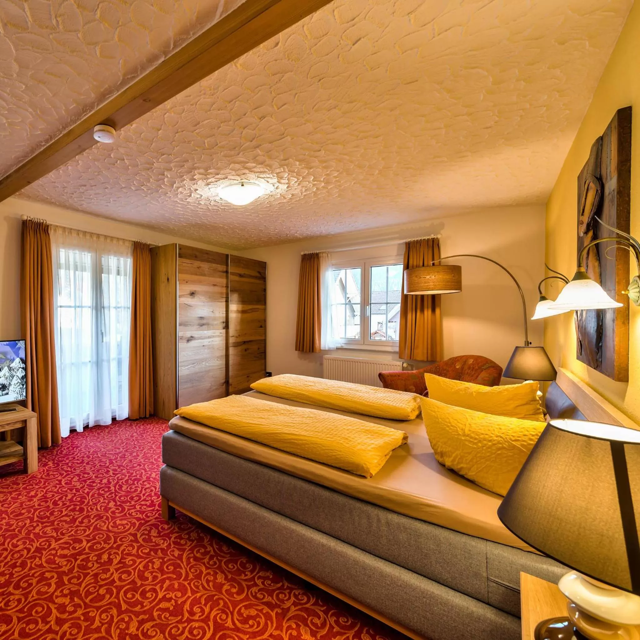 Photo of the whole room, Bed in Hotel Sonneneck Titisee -Adults Only-