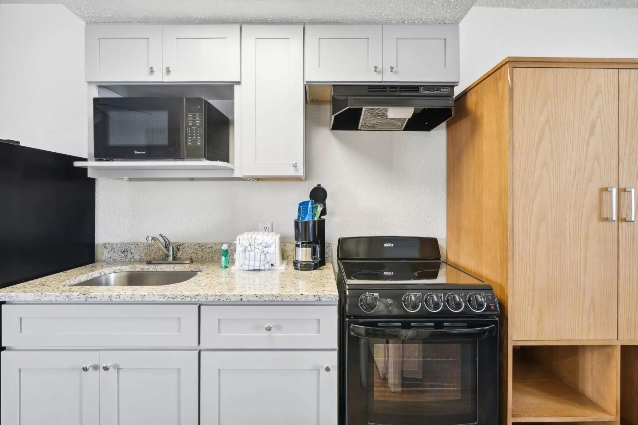 kitchen in Sugar Sands Beachfront Hotel, a By The Sea Resort