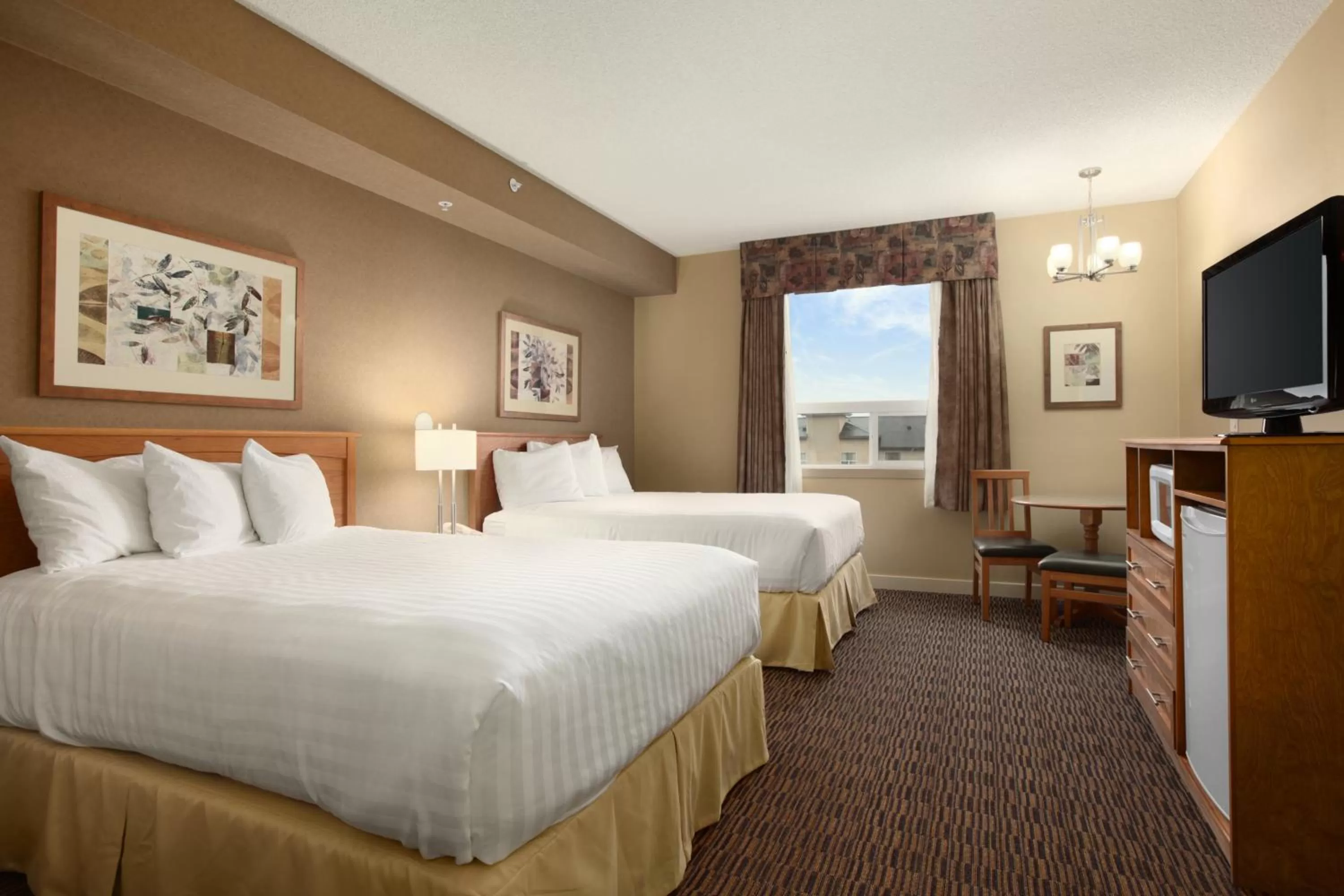 Photo of the whole room, Bed in Days Inn & Suites by Wyndham West Edmonton