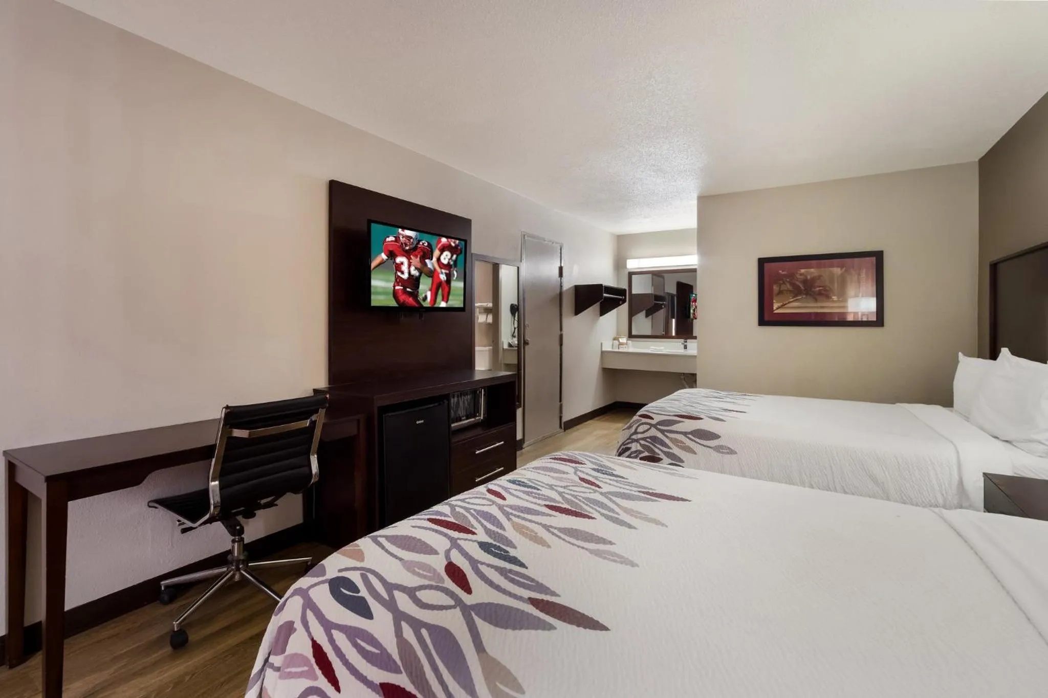 Photo of the whole room, Bed in Red Roof Inn Columbia, SC Airport