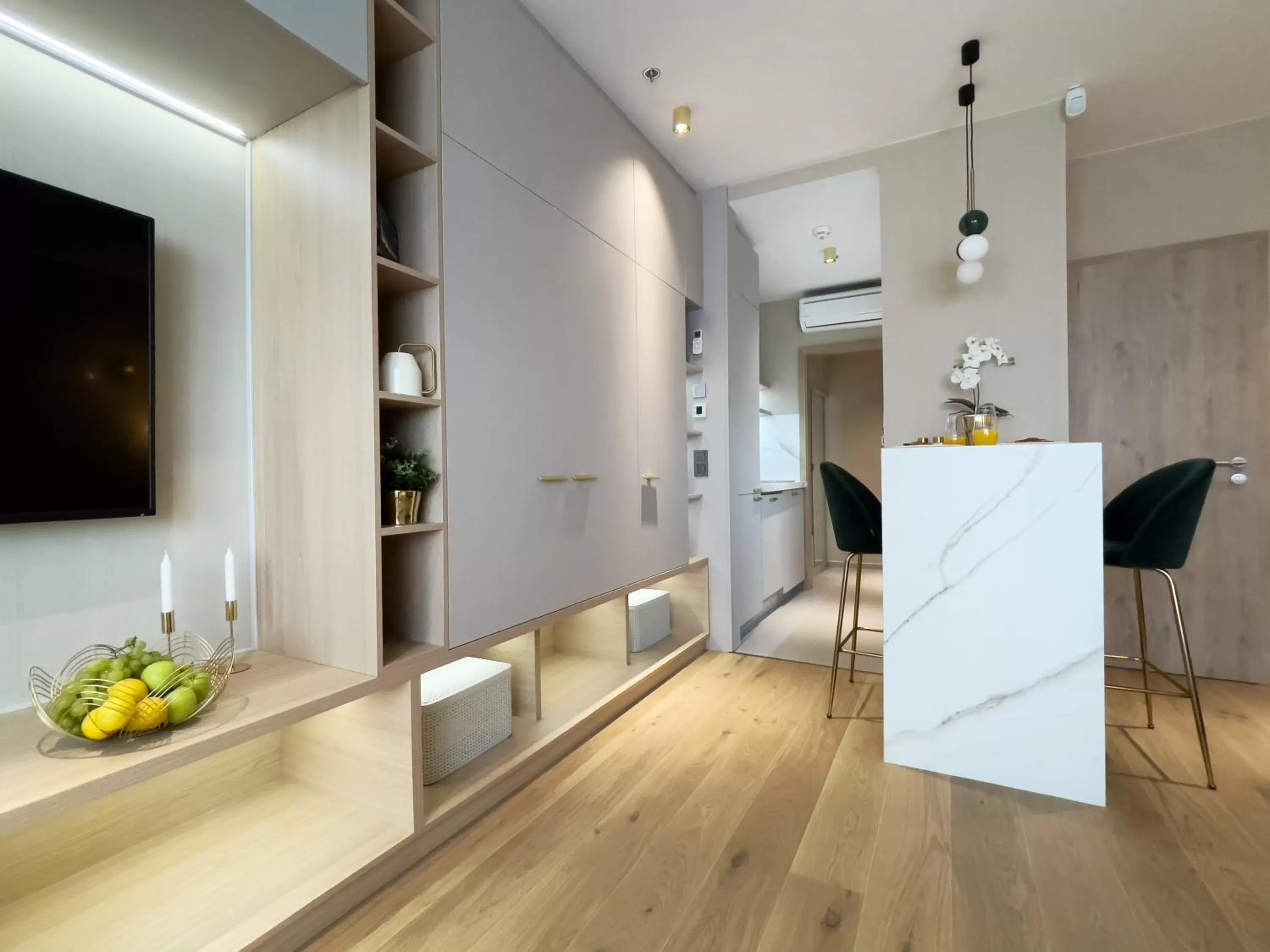 Dining area in Emerald Downtown Luxury Suites by Continental Group