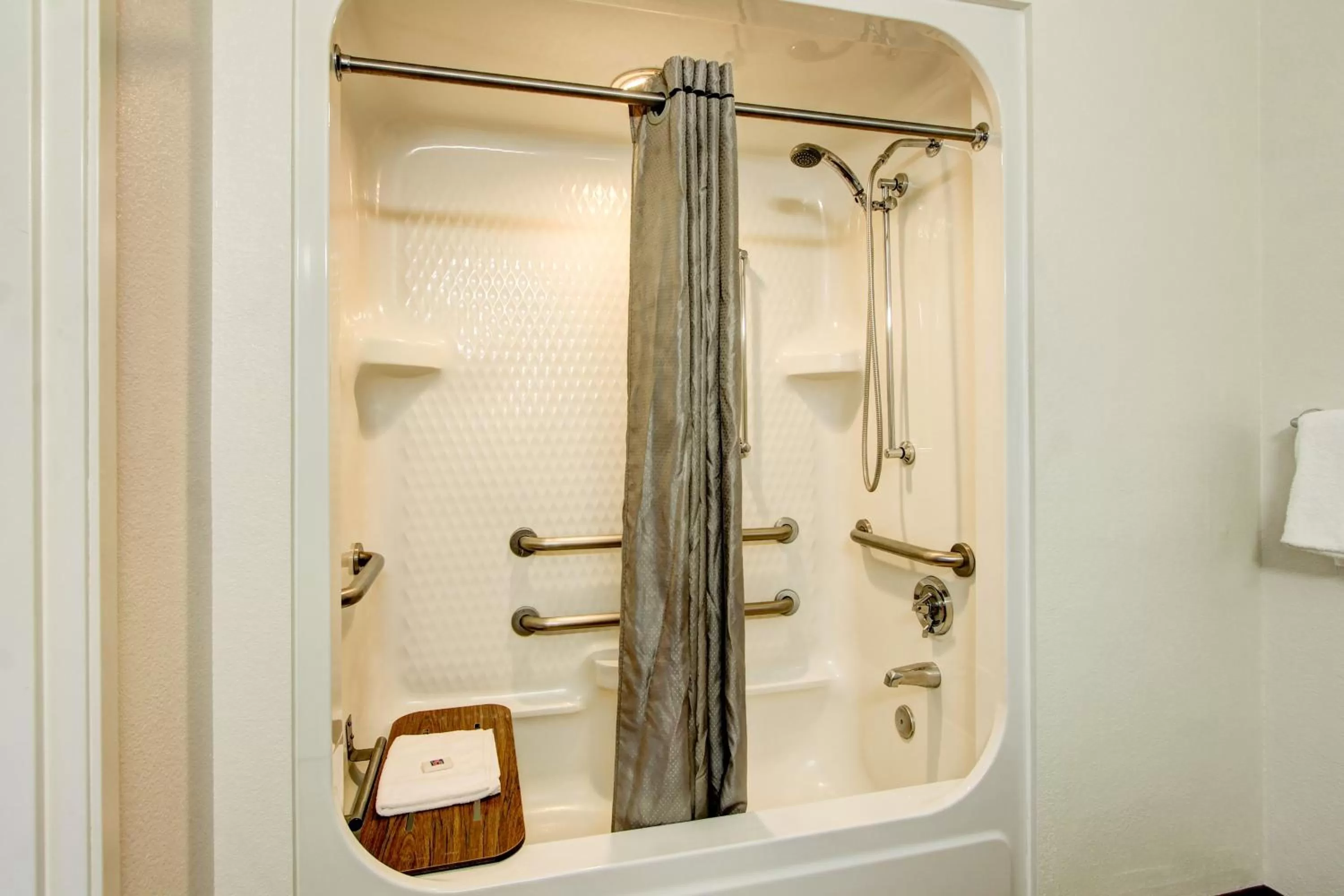 Shower in Super 8 by Wyndham Aurora East