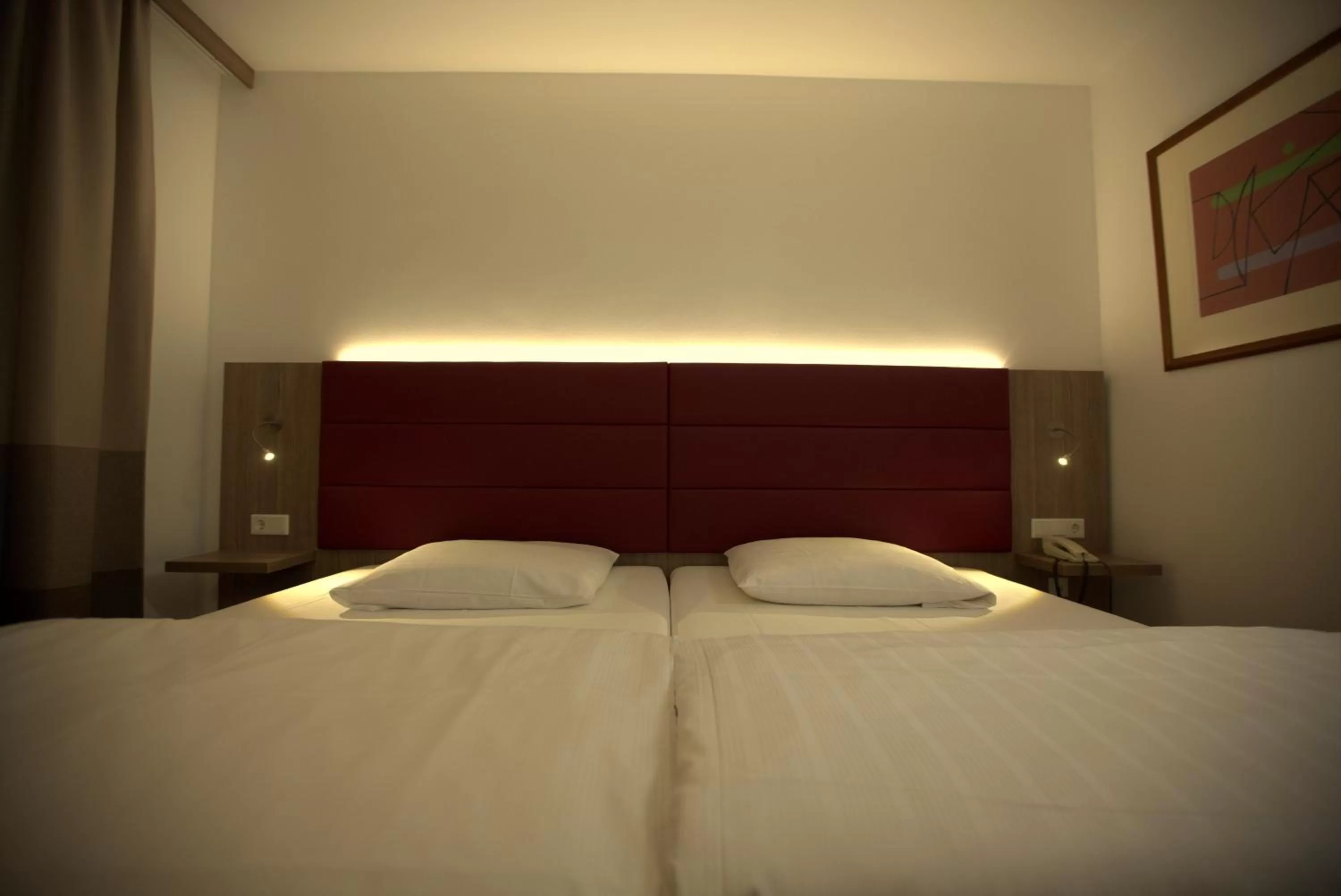 Photo of the whole room, Bed in Airport Hotel Walldorf