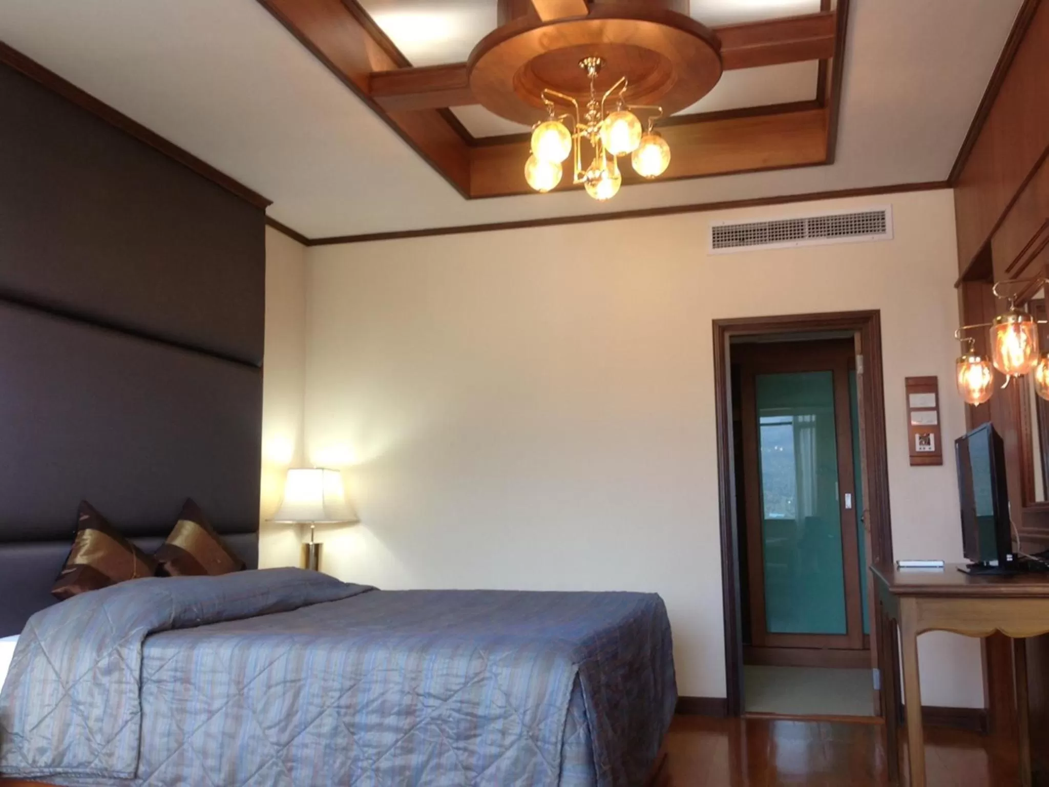 Photo of the whole room, Bed in Chiang Mai Phucome Hotel