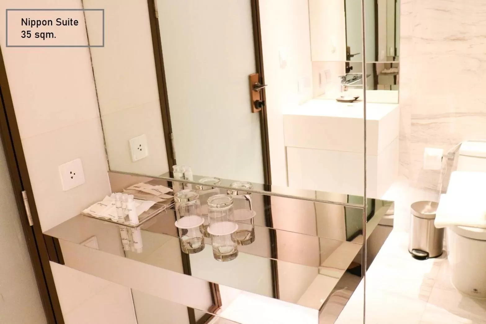 Bathroom in ashley hotel bkk