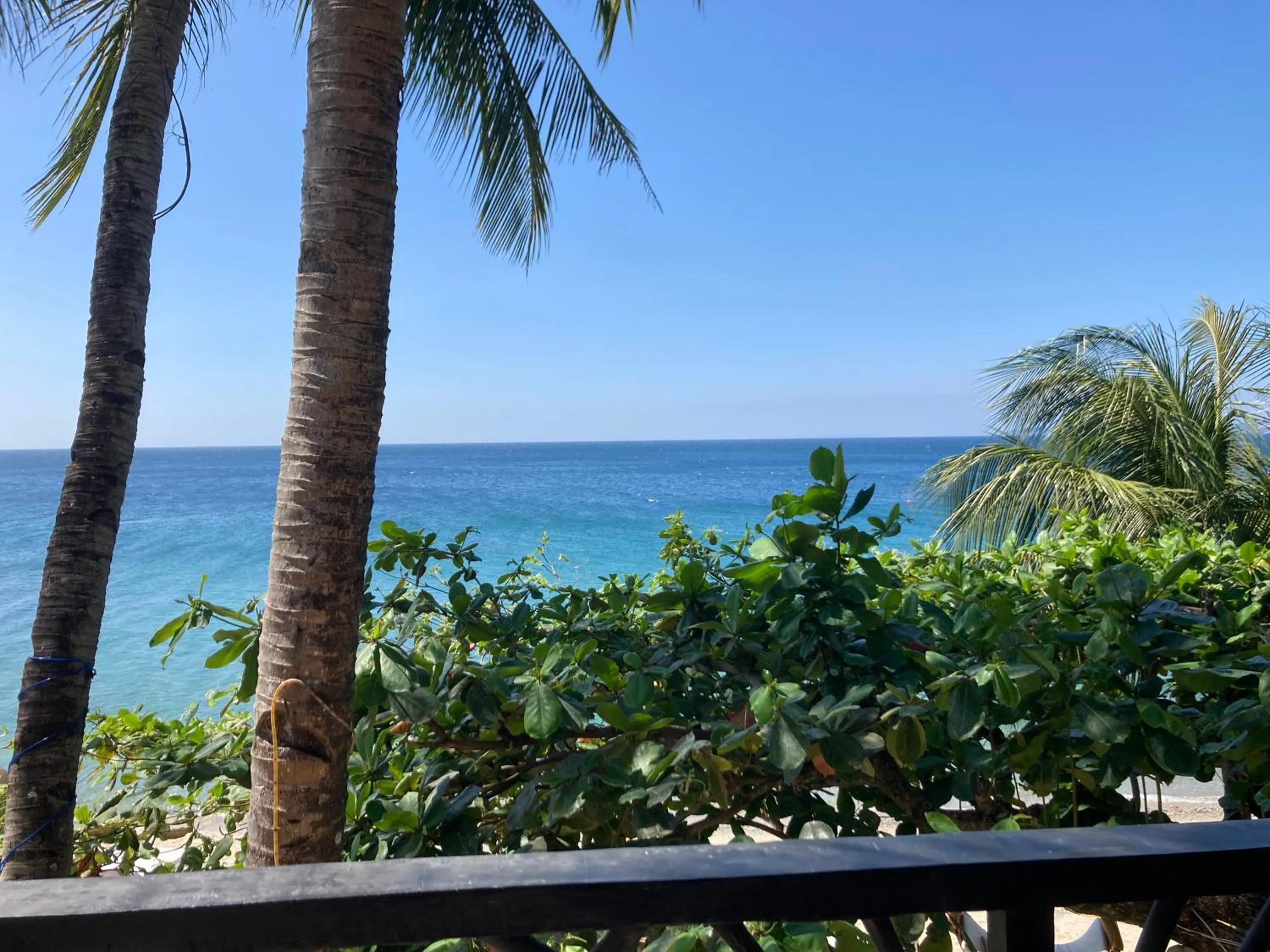 Beach, Sea View in Sunset At Aninuan Beach Resort