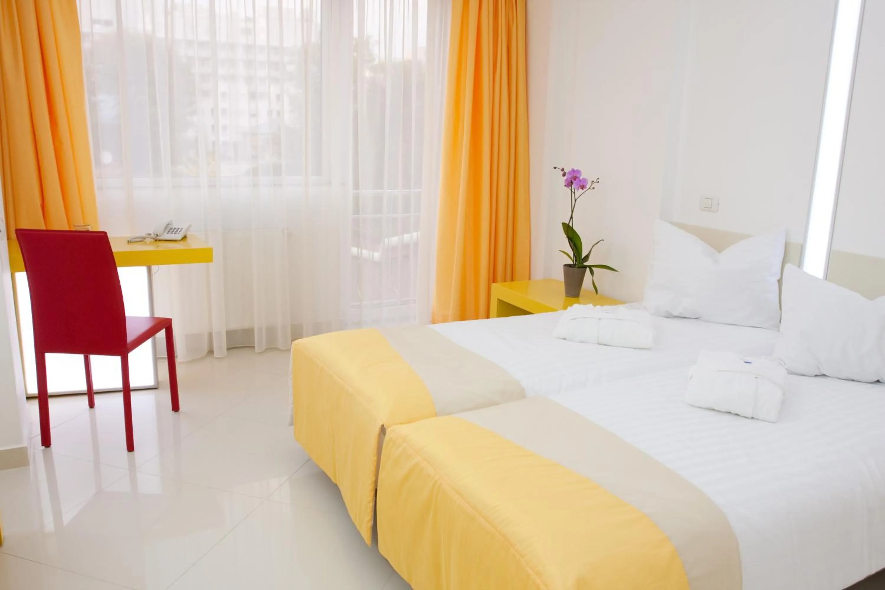 Bed in Christina Hotel