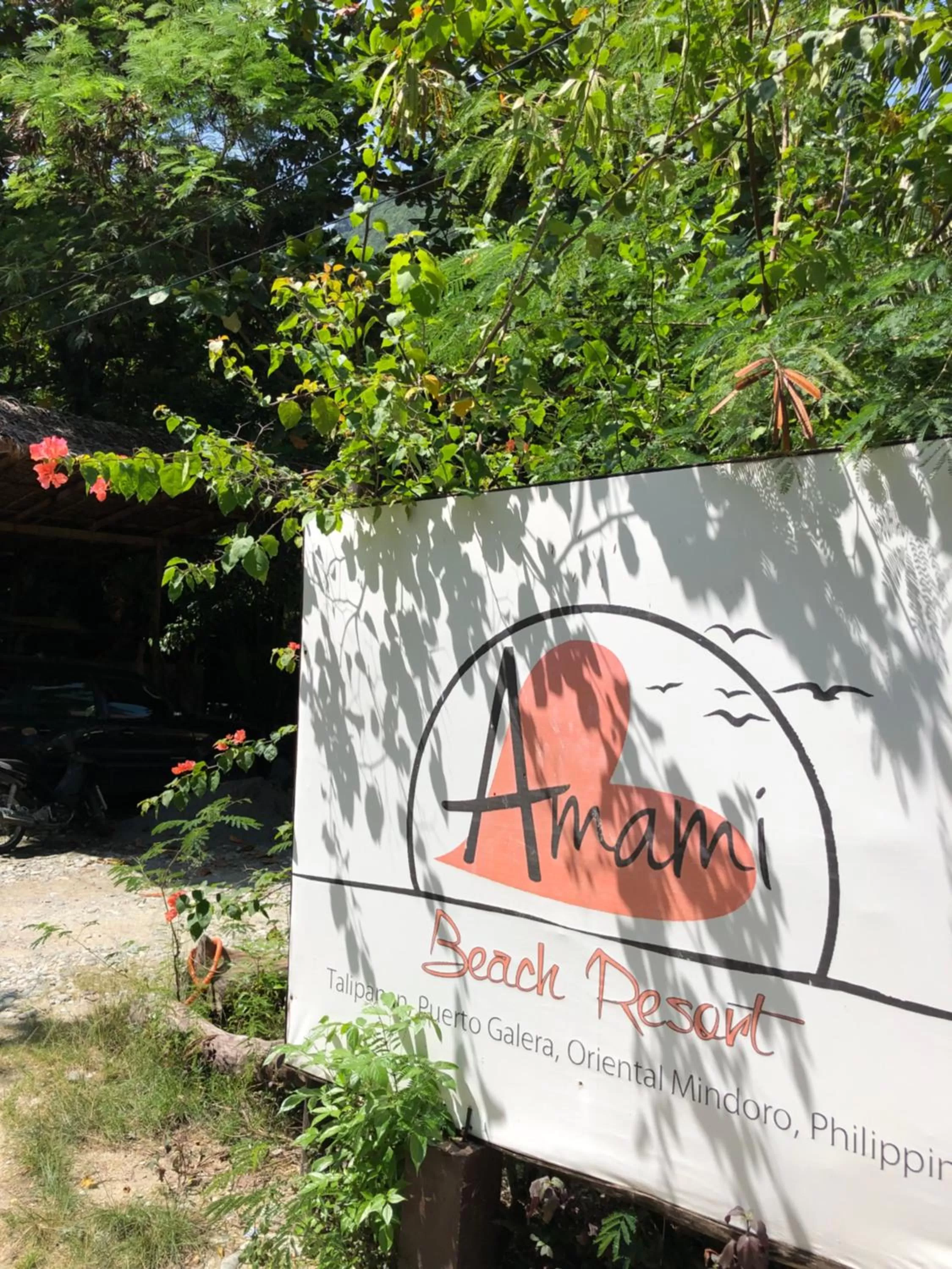 Property logo or sign in Amami Beach Resort